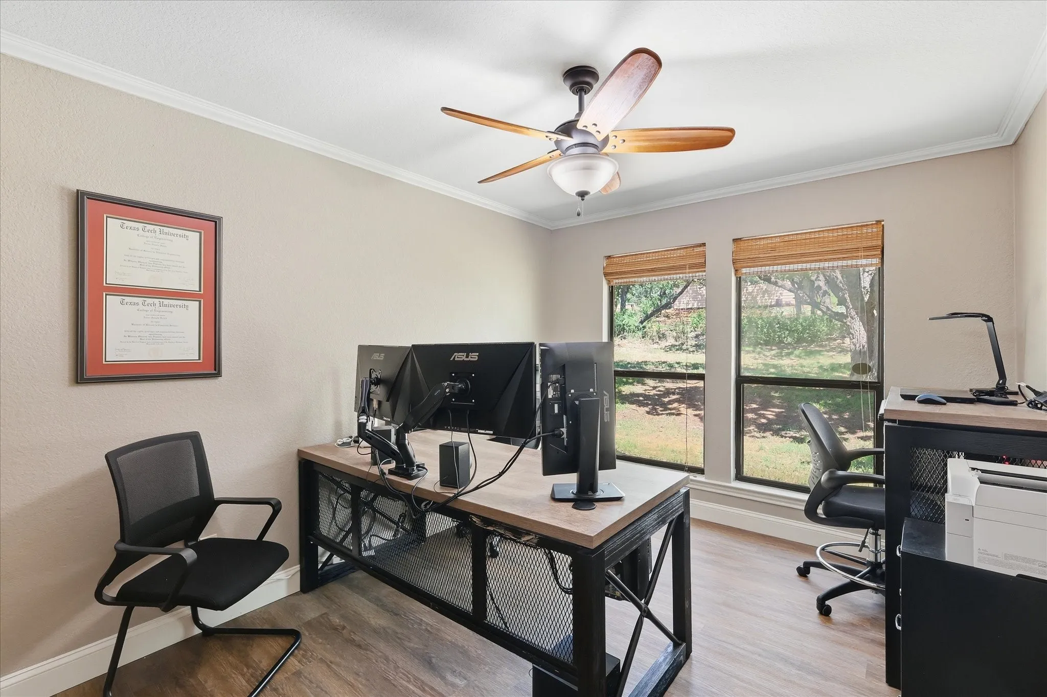 Office downstairs with french doors, bonus room not pictured across the hall used as a hobby room