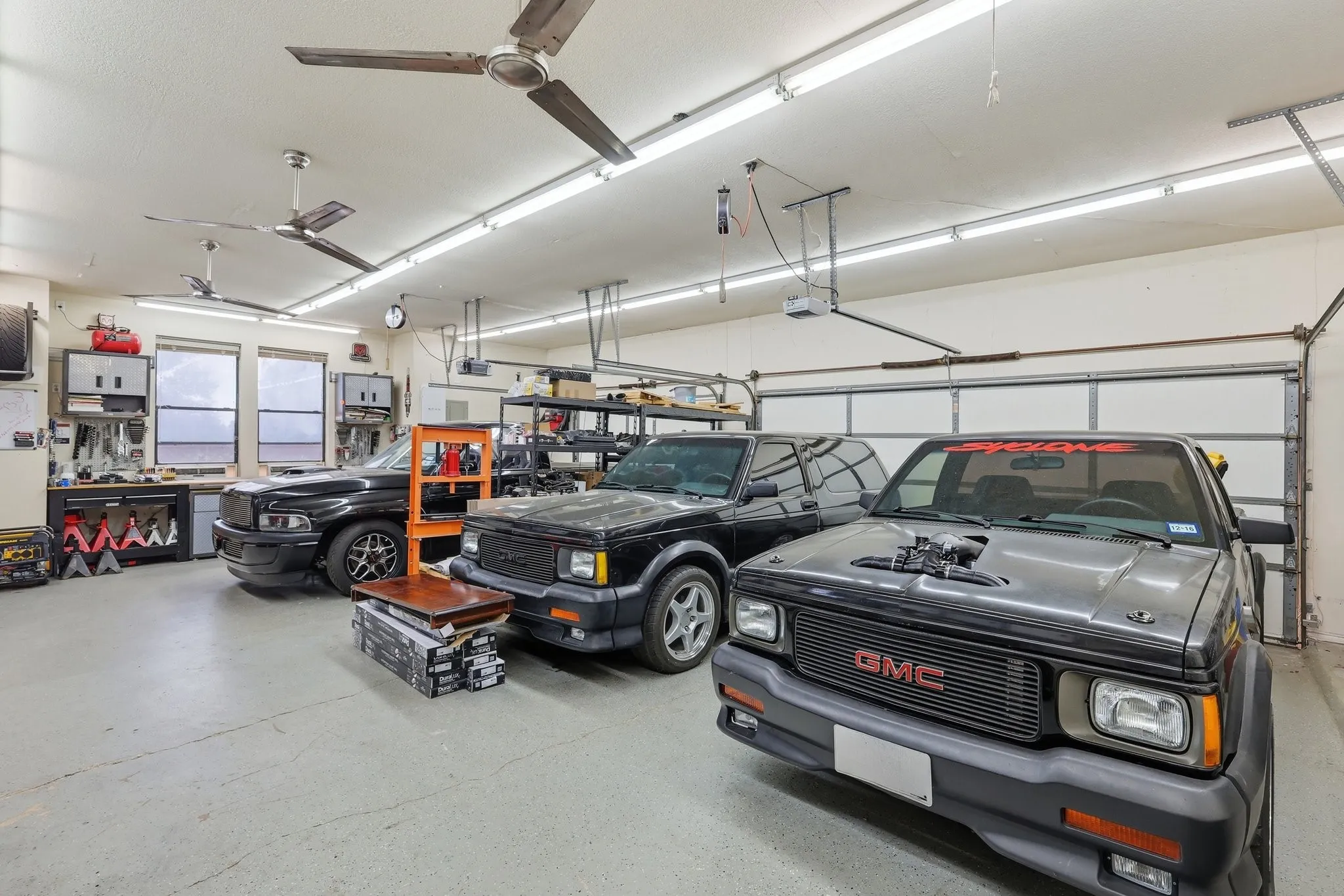 3 car, oversized garage used as a shop with HIGH ceilings!