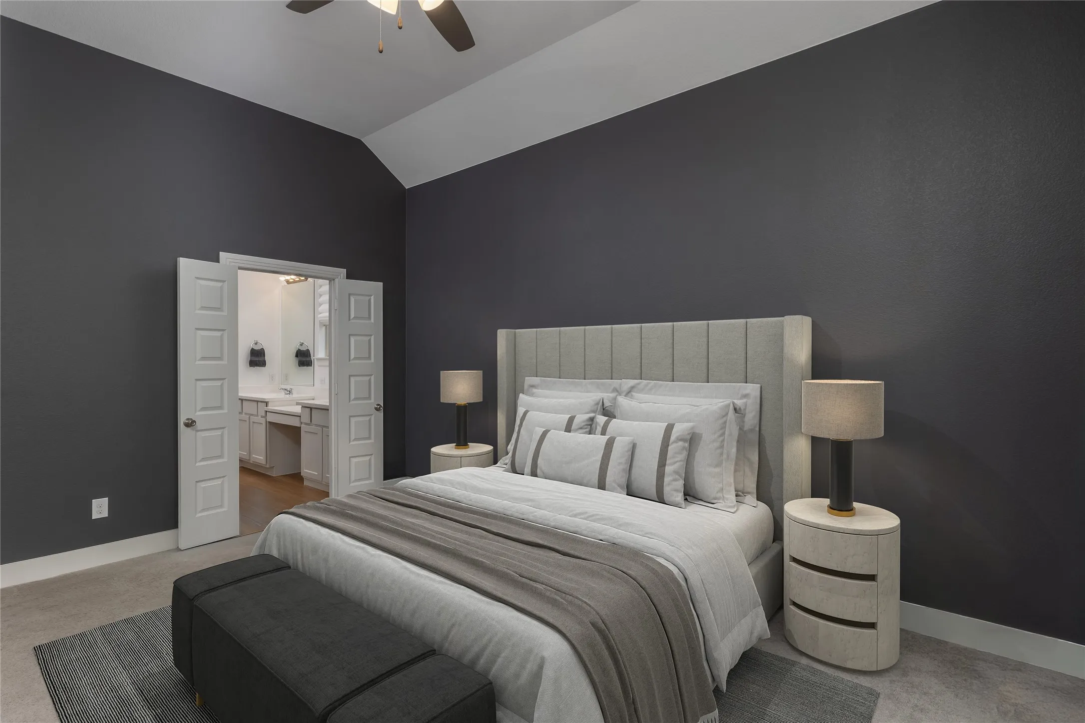 Bedroom featuring a vaulted ceiling and a ceiling fan