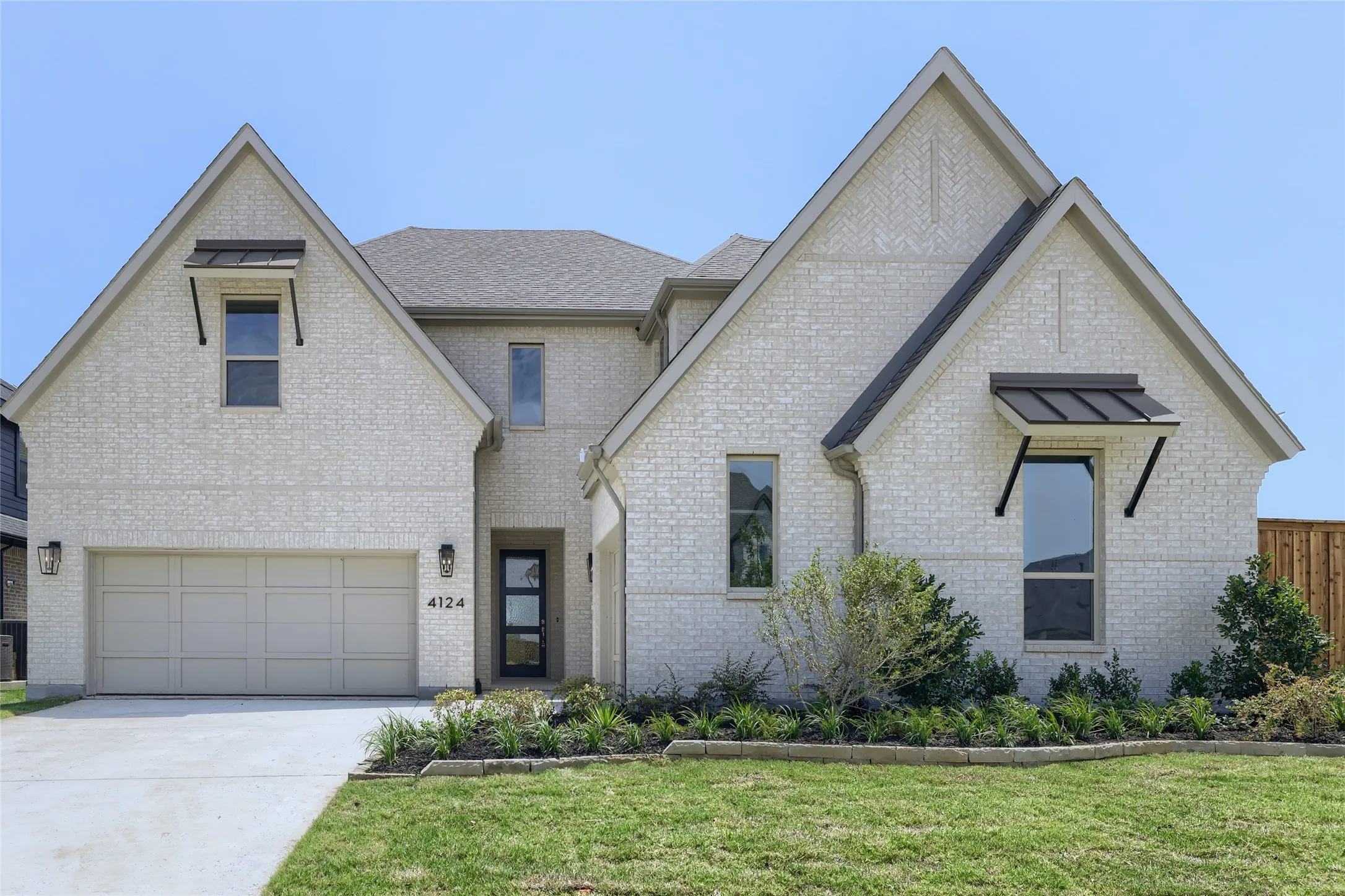 Contemporary brick exterior with gabled rooflines