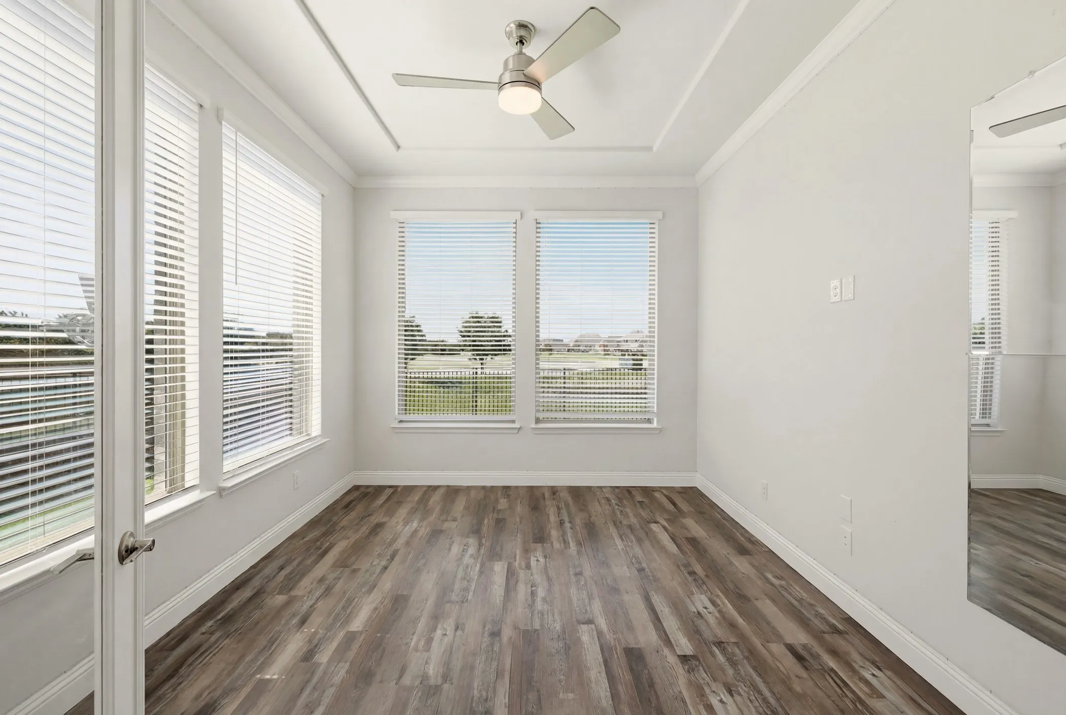Office (shown vacant and currently used as exercise room) with French doors and tons of natural light!