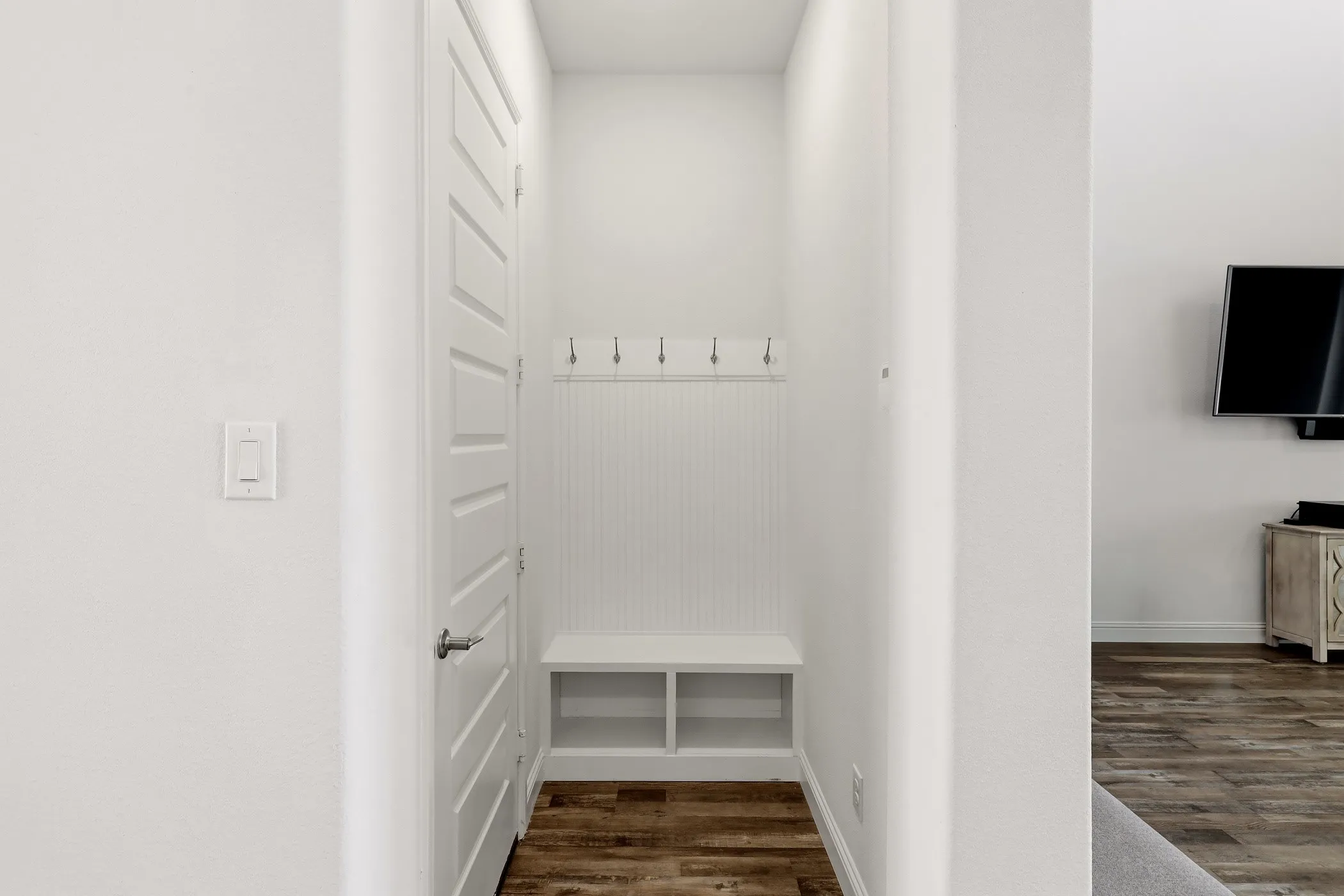 Mud room storage from garage.