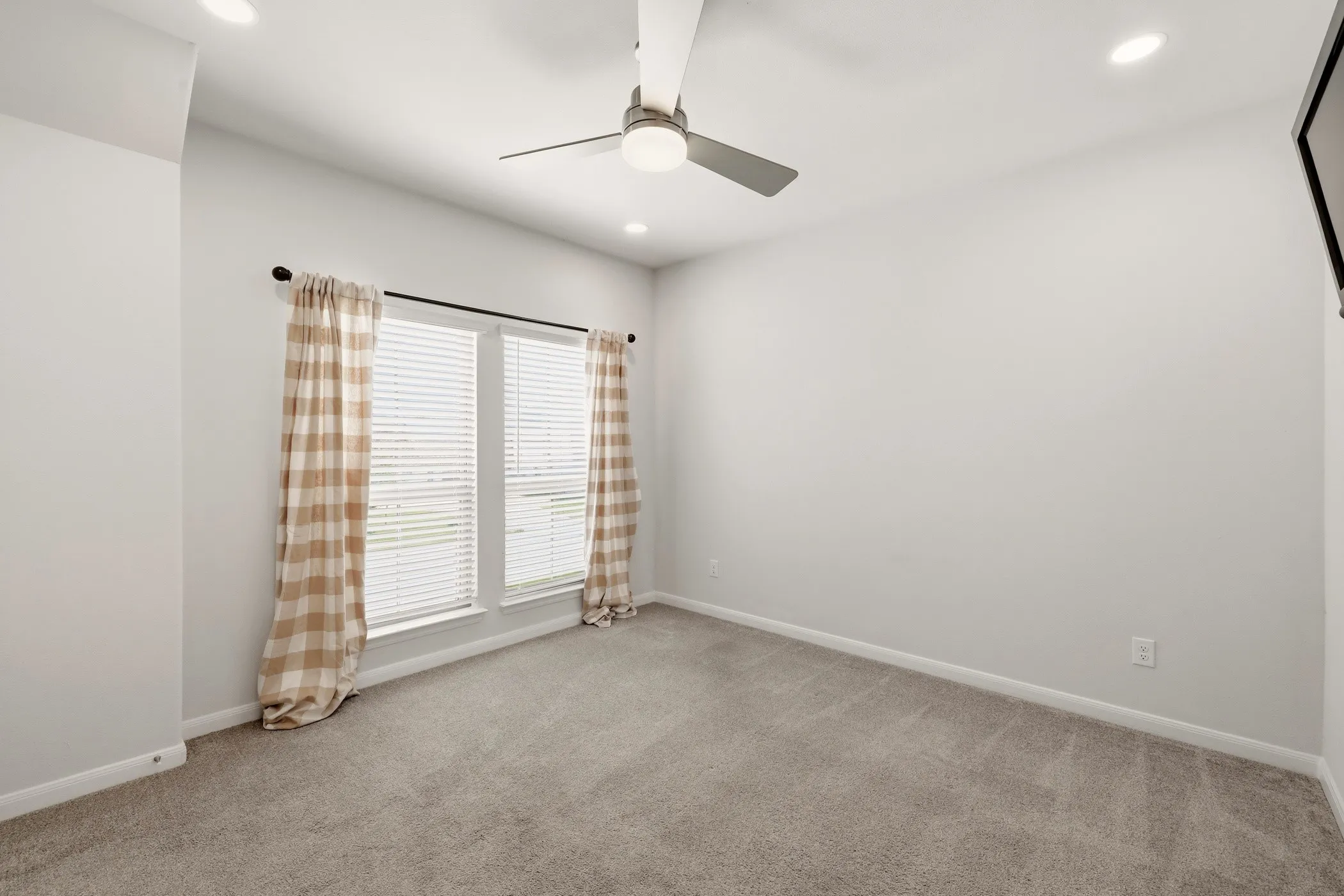 Bedroom #3 with bathroom nearby in the hallway.