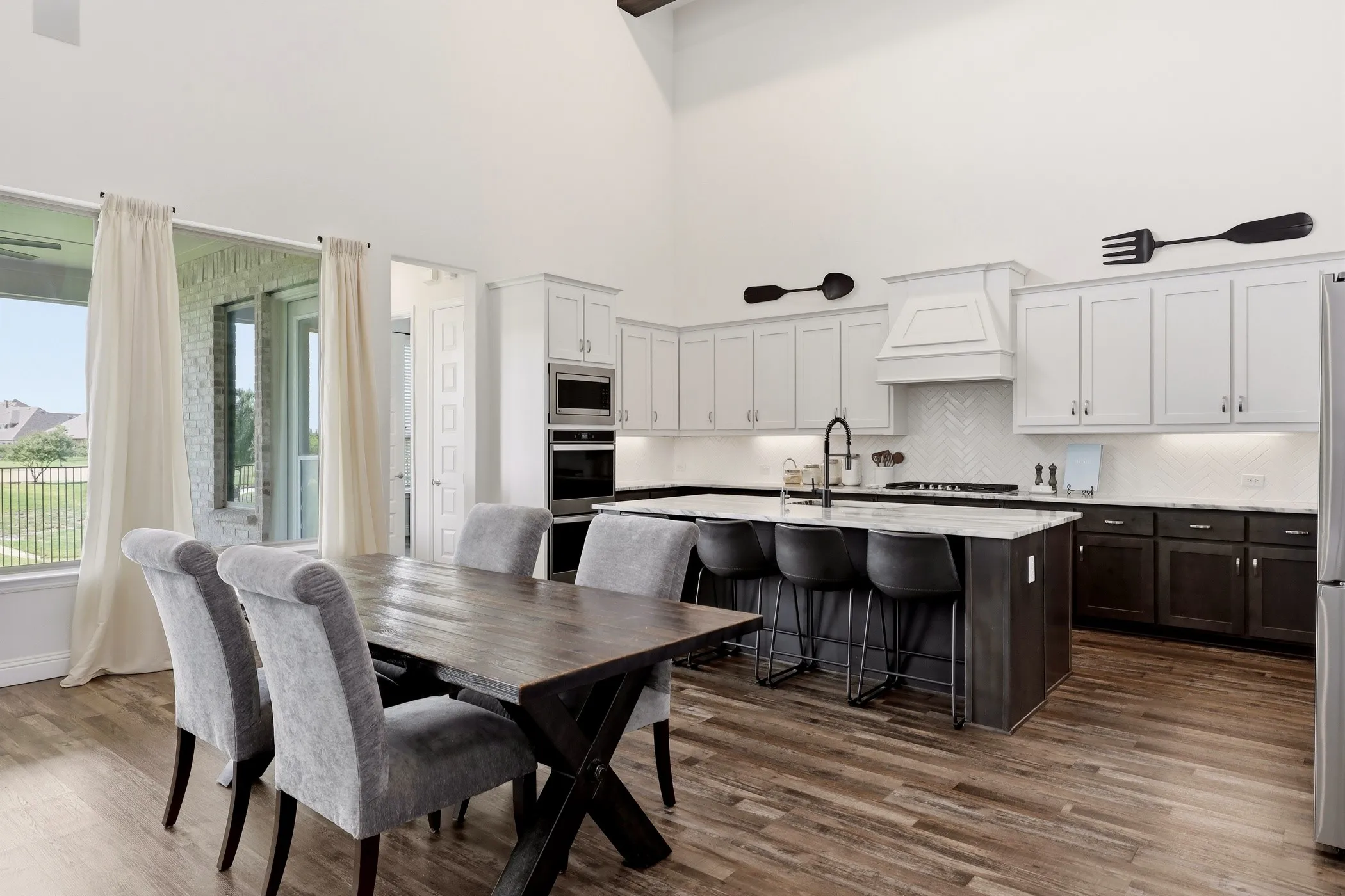 Breakfast room open to kitchen and living room.
