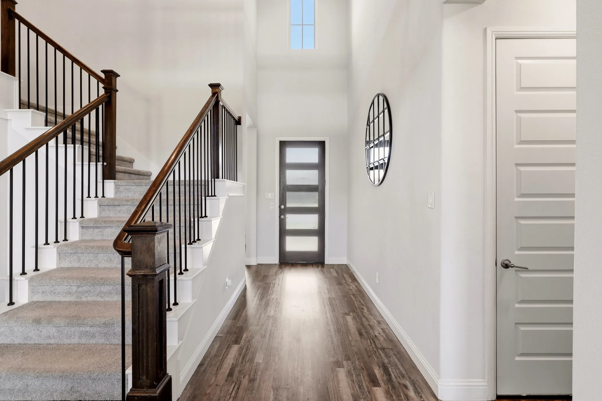 Elegant entry and staircase.
