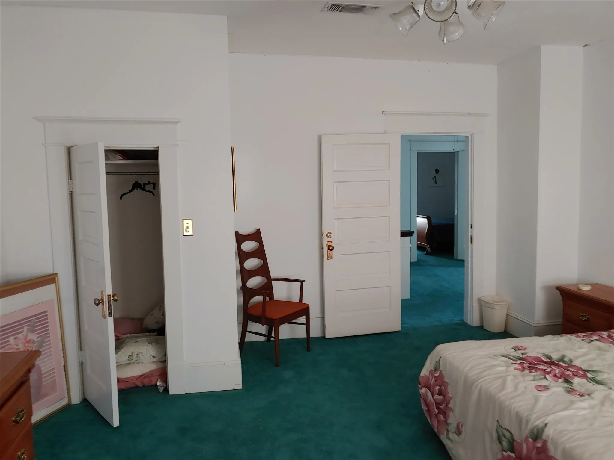 Upstairs bedroom at the top of the stairs