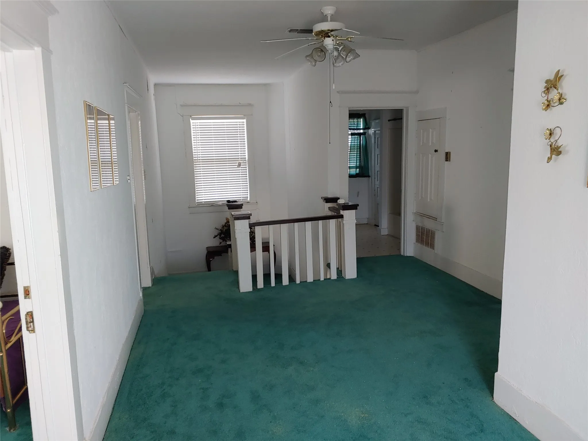 Upstairs corridor area leading to stairs