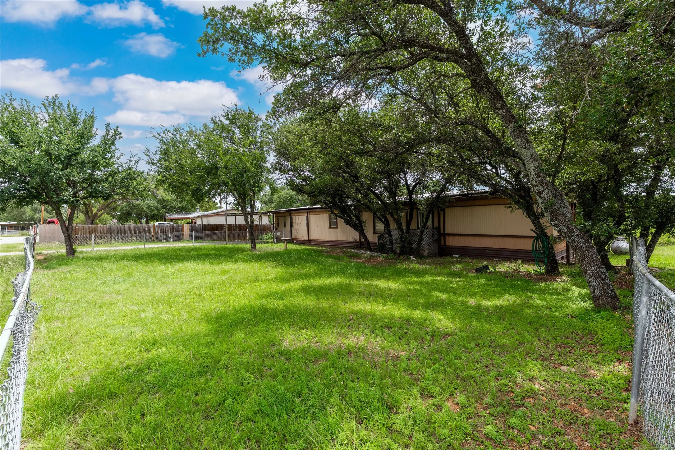 Mobile Home For Sale in Brown County , 4500 Lake Shore Drive, May, Texas 76857, 2 Bedroom, 2 Bathroom, Garage spaces, 1,064 Sqft, built in 1982, mls#21300524, Real Estate Agent in May, Homes For Sale in Brown county, Homes For Sale in May, Realtor in May Texas, Real Estate Brokerage Independent Realty Texas, Luminita Cordes Realtor
