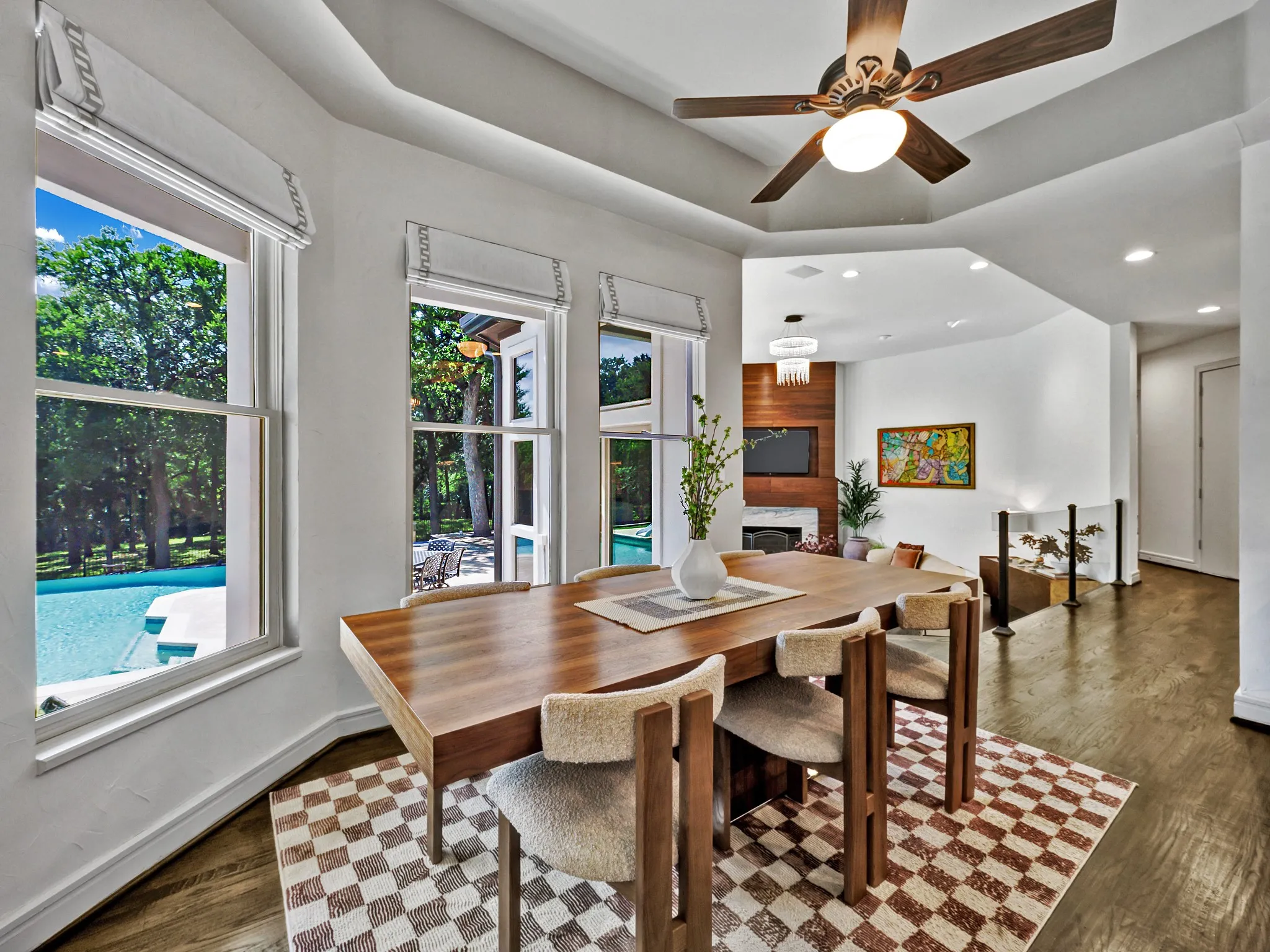 Breakfast area with recessed lighting and a ceiling fan, featuring a tray ceiling