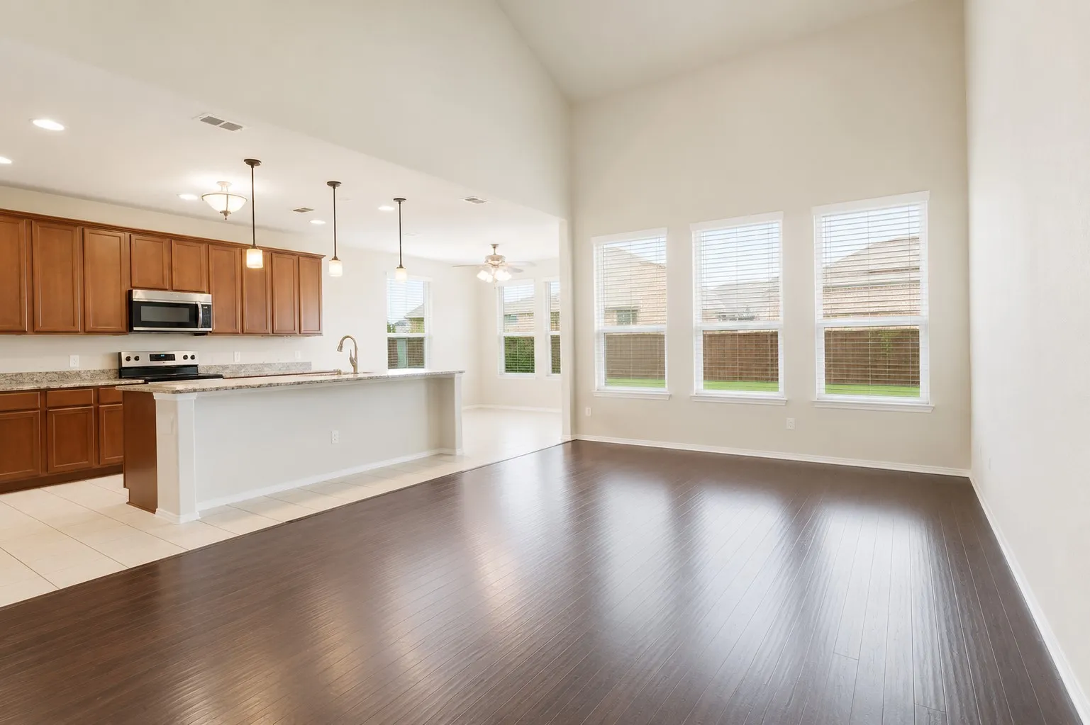 Living room and kitchen of 802 Swan Ridge Drive, Sherman, TX in The Preserve