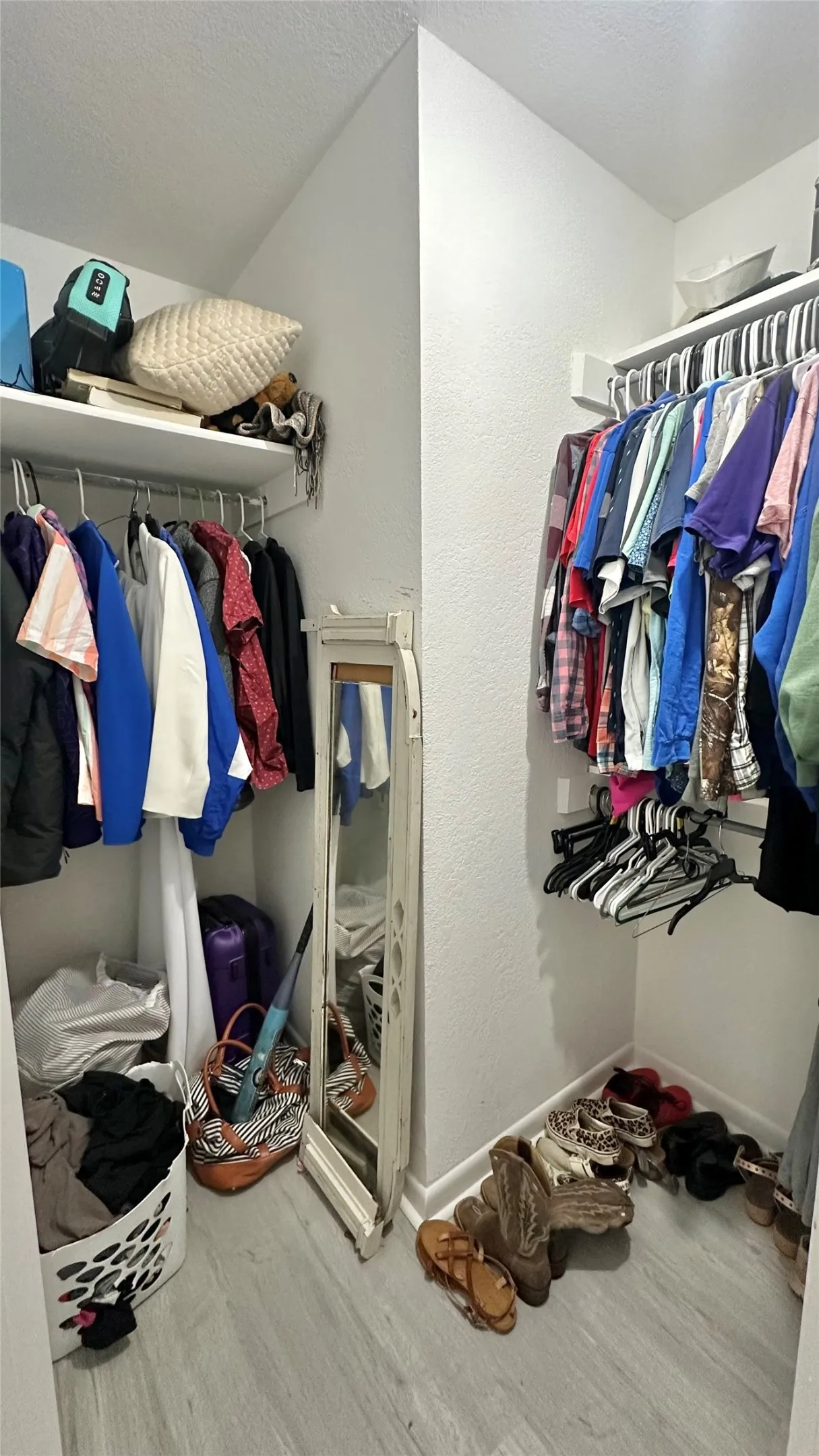 Walk-in closet with hanging rods