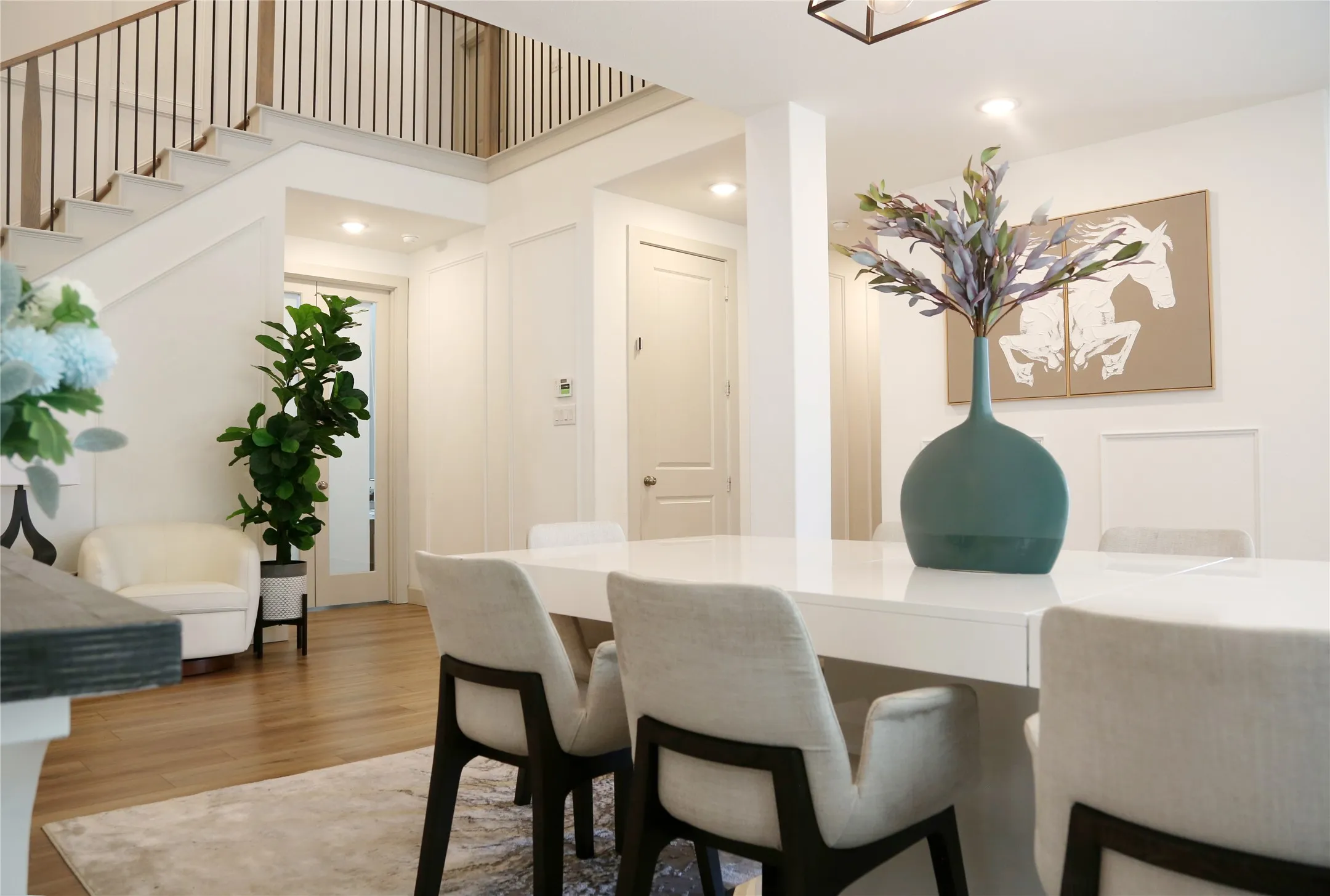 Dining area with view of double doors to office/flex area