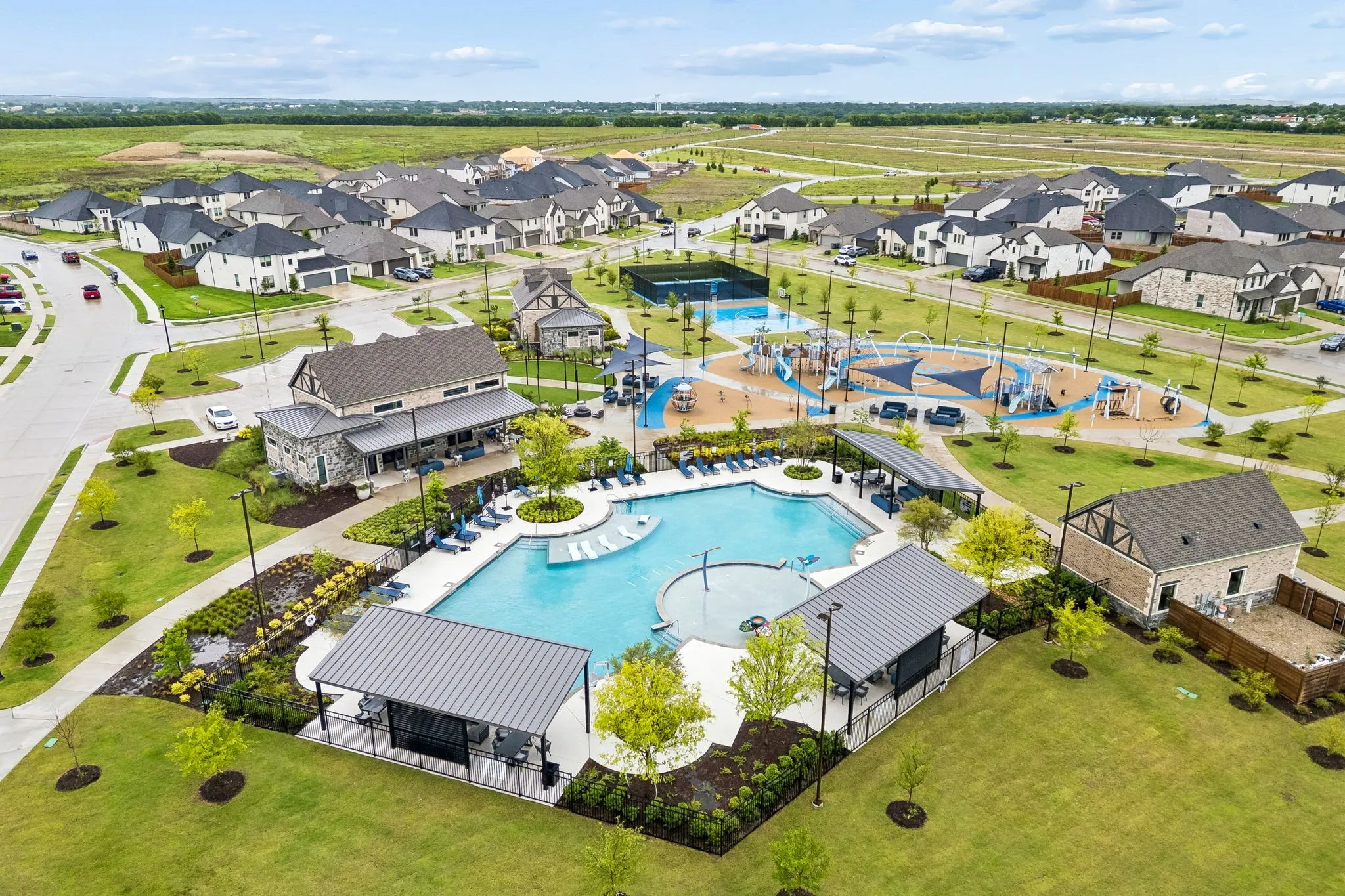 Community pool, playground, basketball court, and pickleball courts