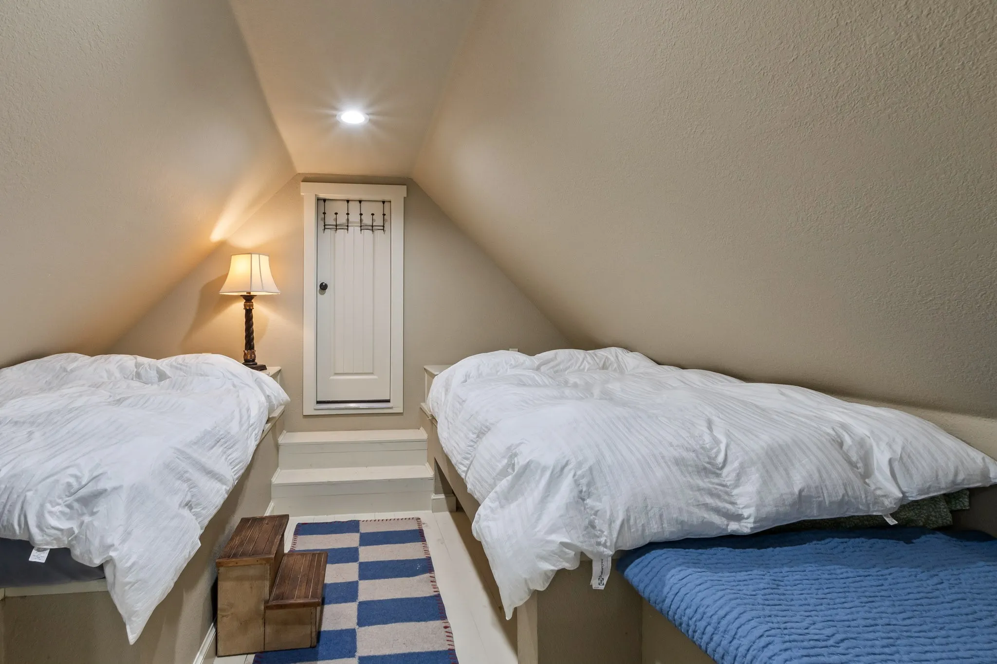 Built in Bunk Room with doorway to attic access with opportunity to expand or also makes storage.