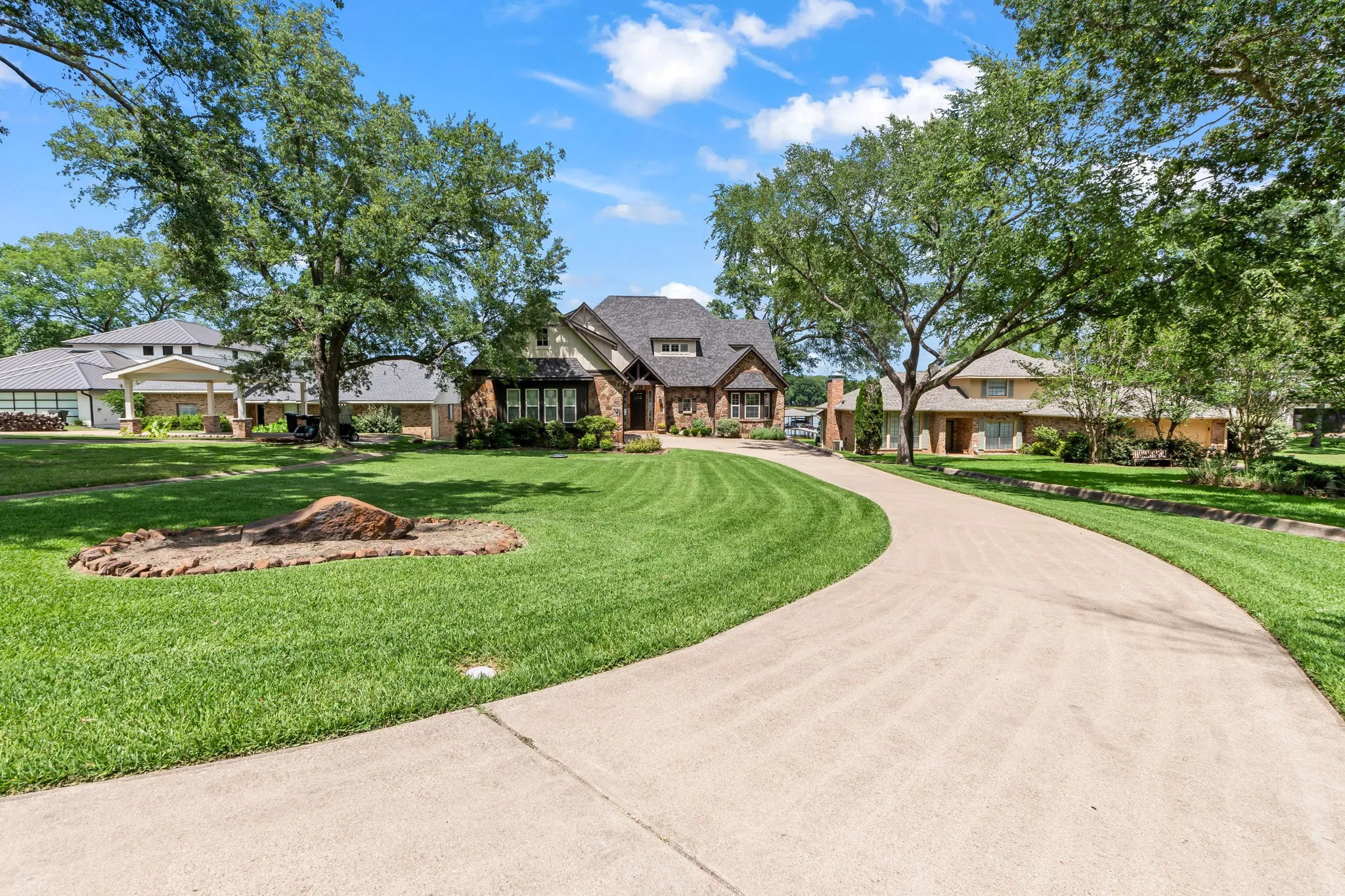 Long winding driveway offering privacy and ample parking.