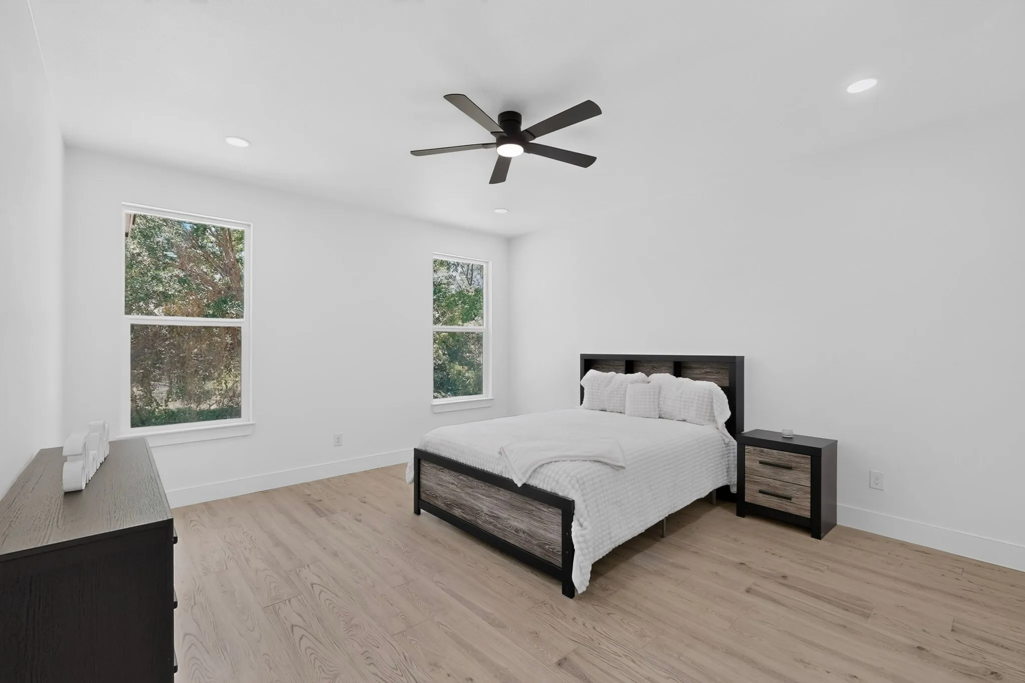 Bright interior space featuring light wood-finish flooring