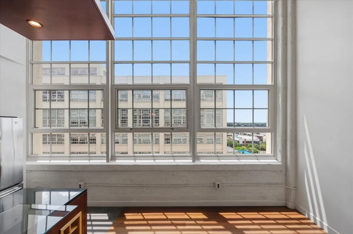 Ceilings are 15 feet tall. Windows are 12 feet tall