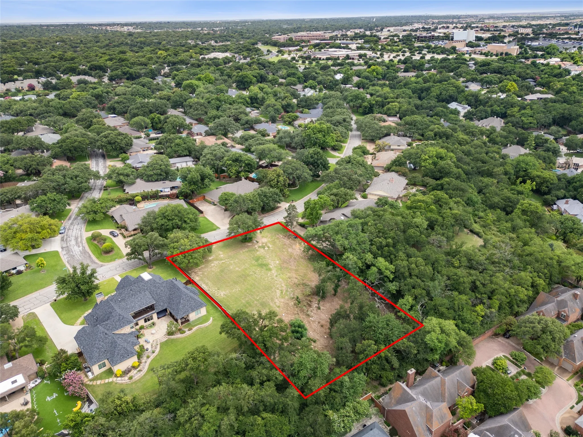 Approximate boundary lines shown for reference only; aerial view illustrates the scale, depth, and estate-home potential of this rare Overton West lot.