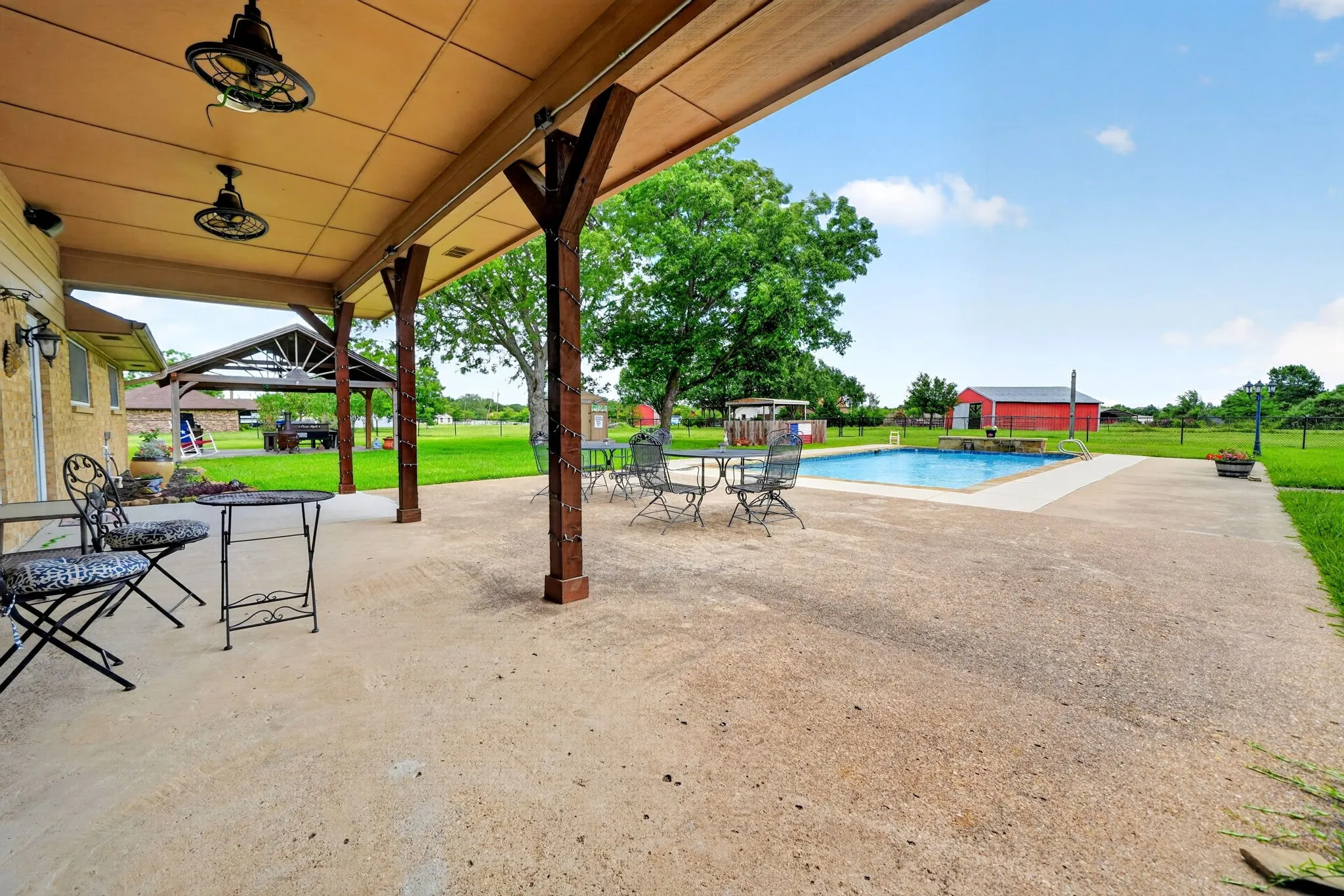 Boasts of outdoor living spaces both covered and open!