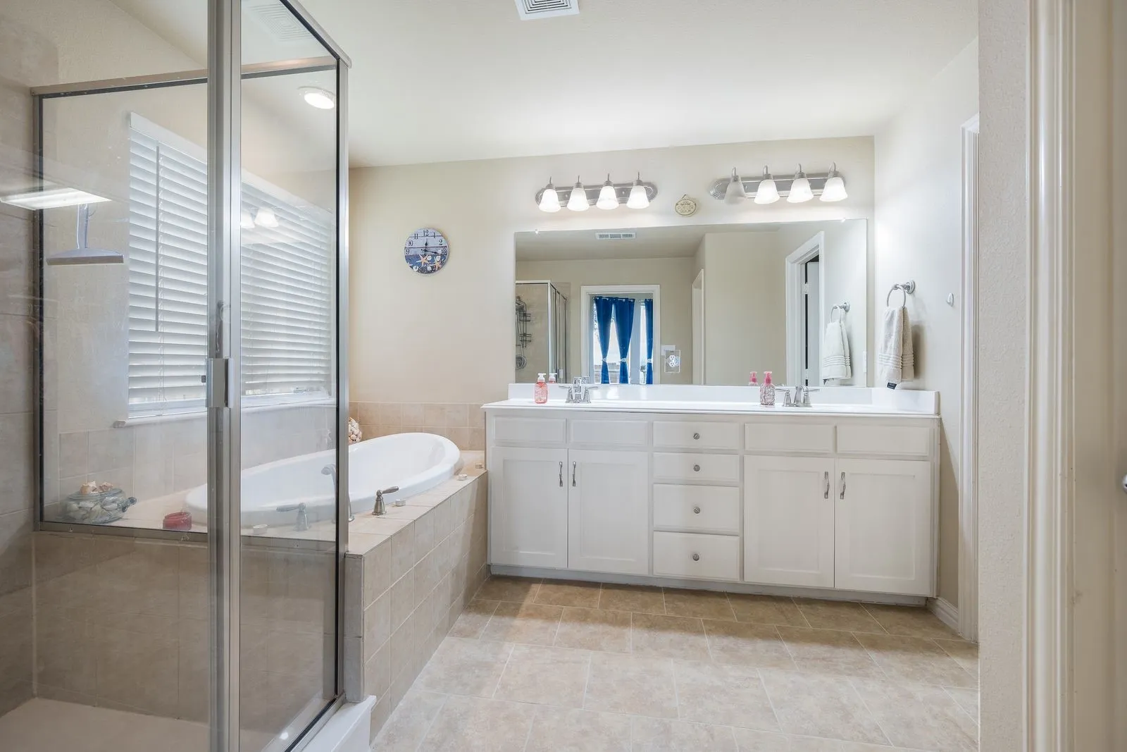 Master bath has garden tub and separate shower