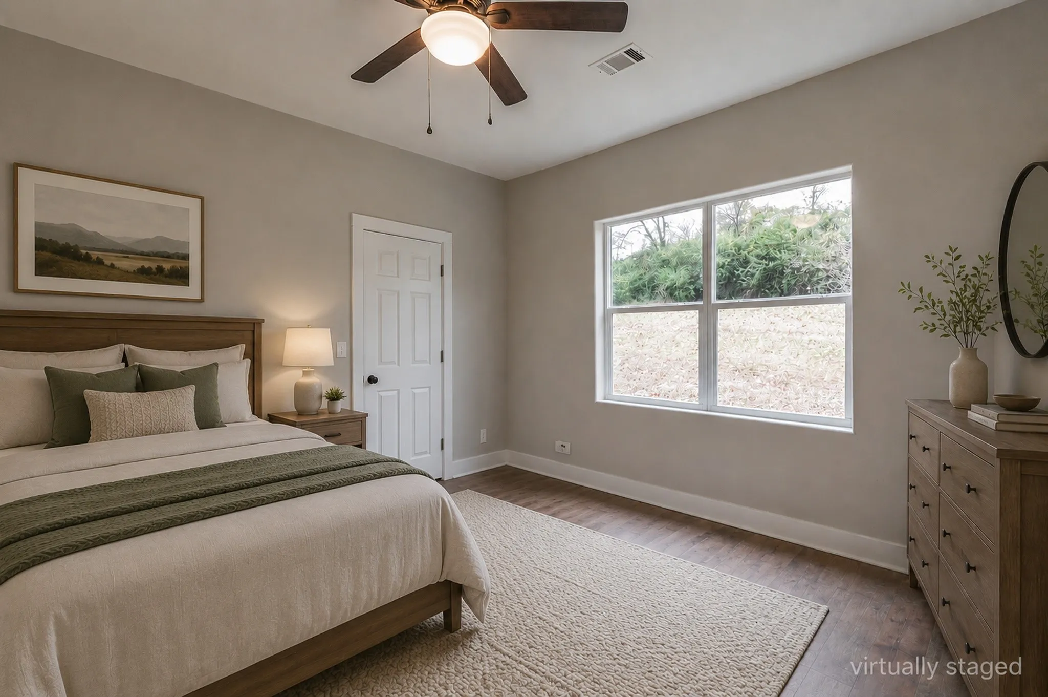 Bright interior space featuring a window with a natural outdoor backdrop