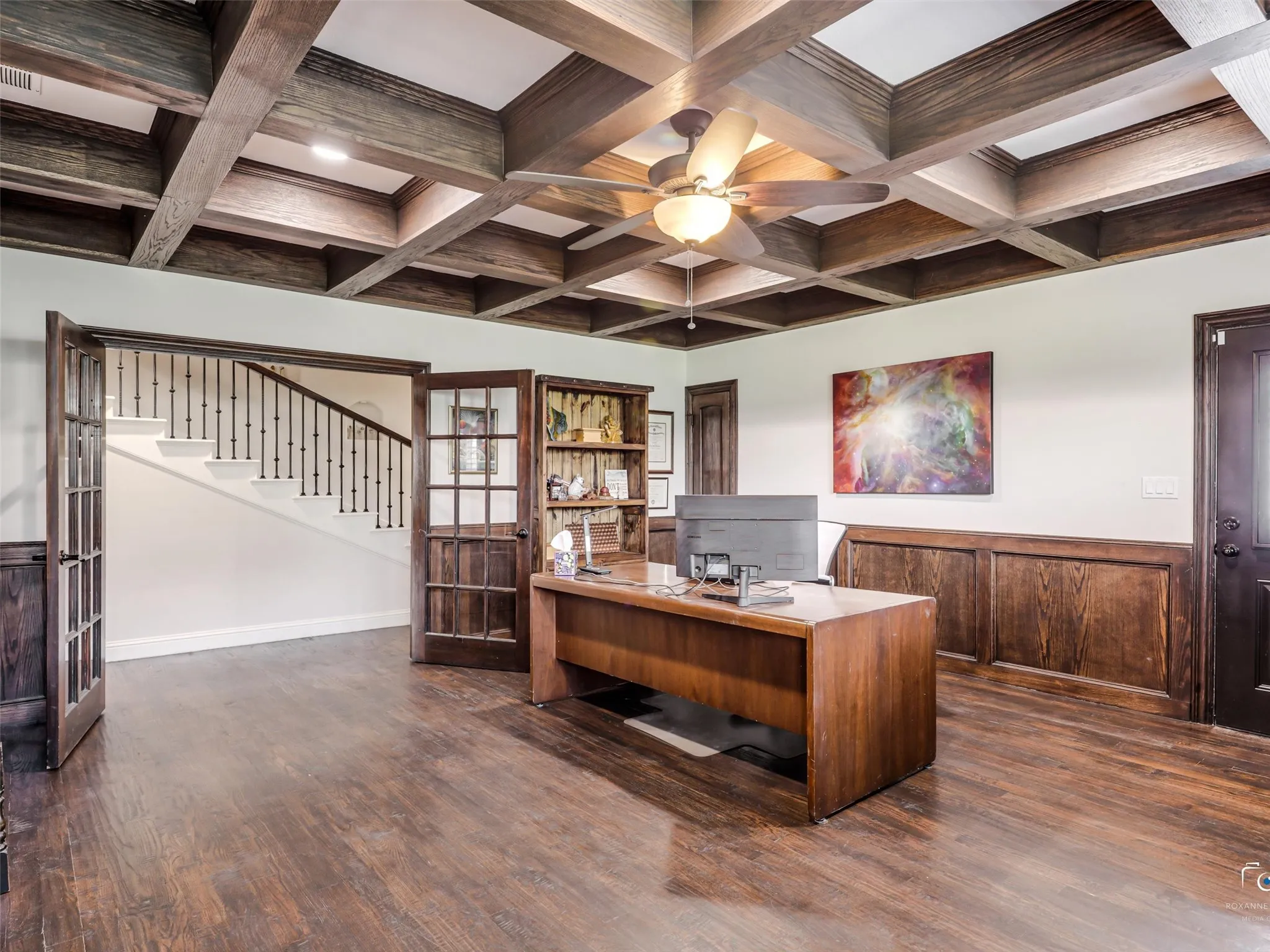 Coffered ceiling with a central fan light fixture