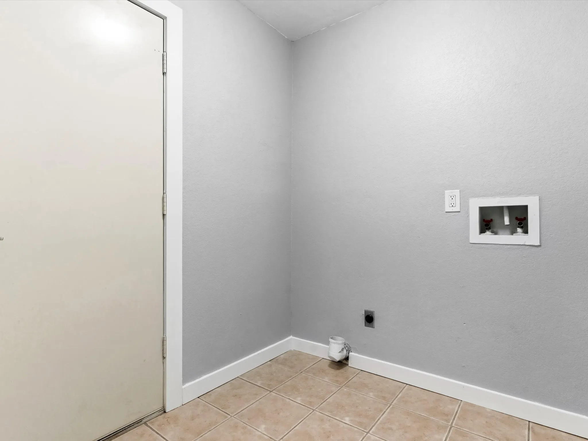 Laundry area with convenient access to main living spaces.