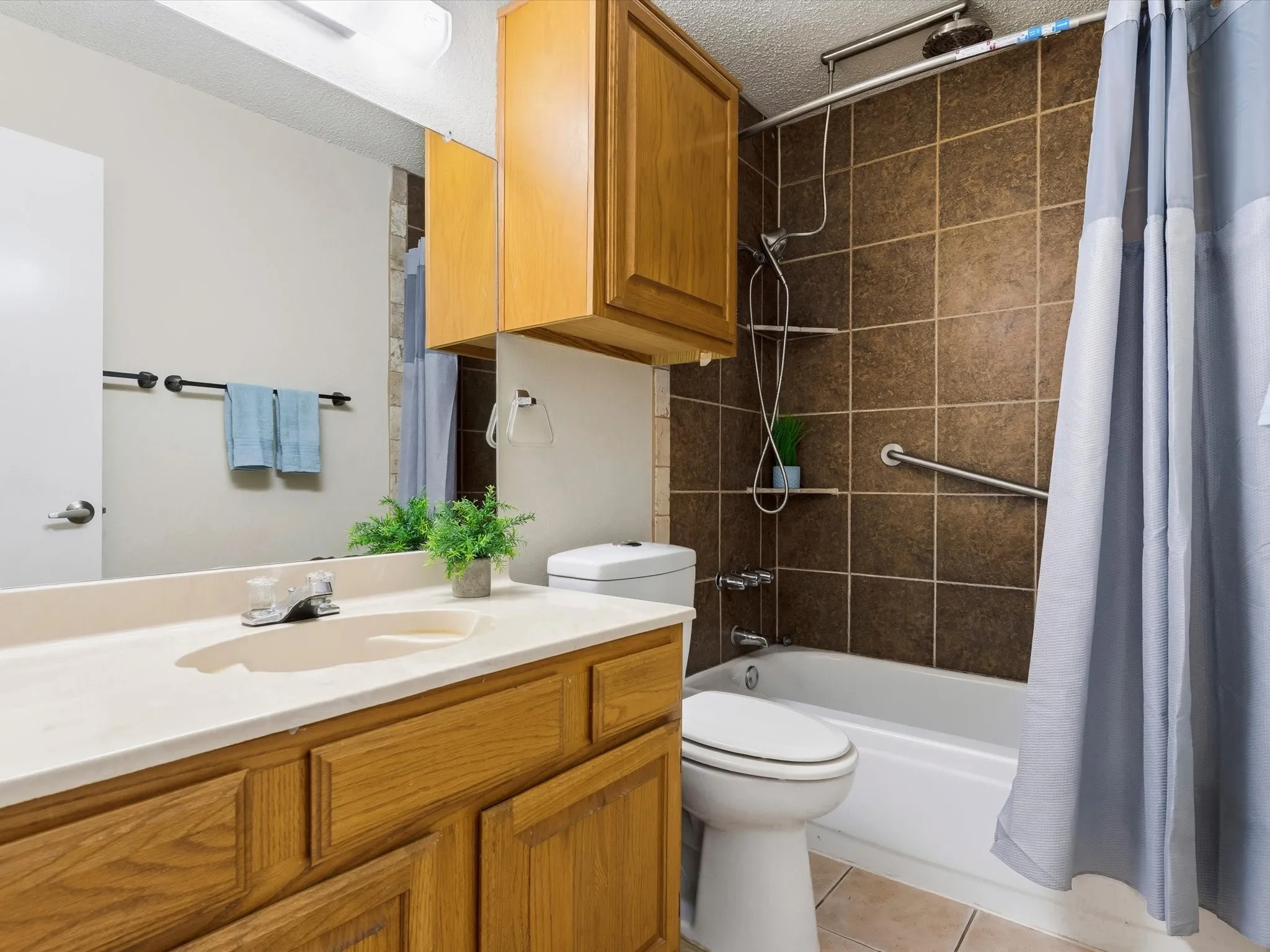 Full guest bathroom serving secondary bedrooms.