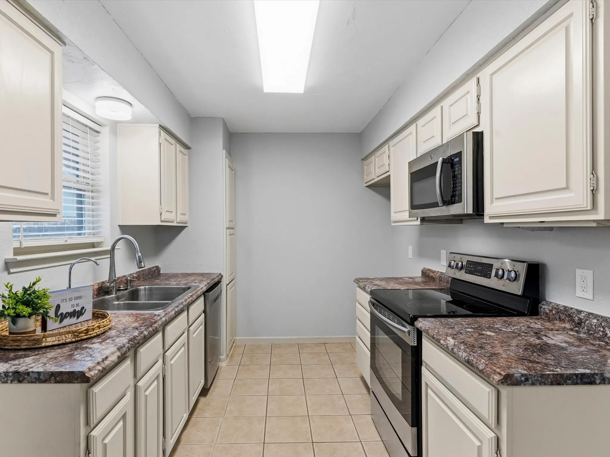 Kitchen with functional layout designed for everyday meal preparation and entertaining.