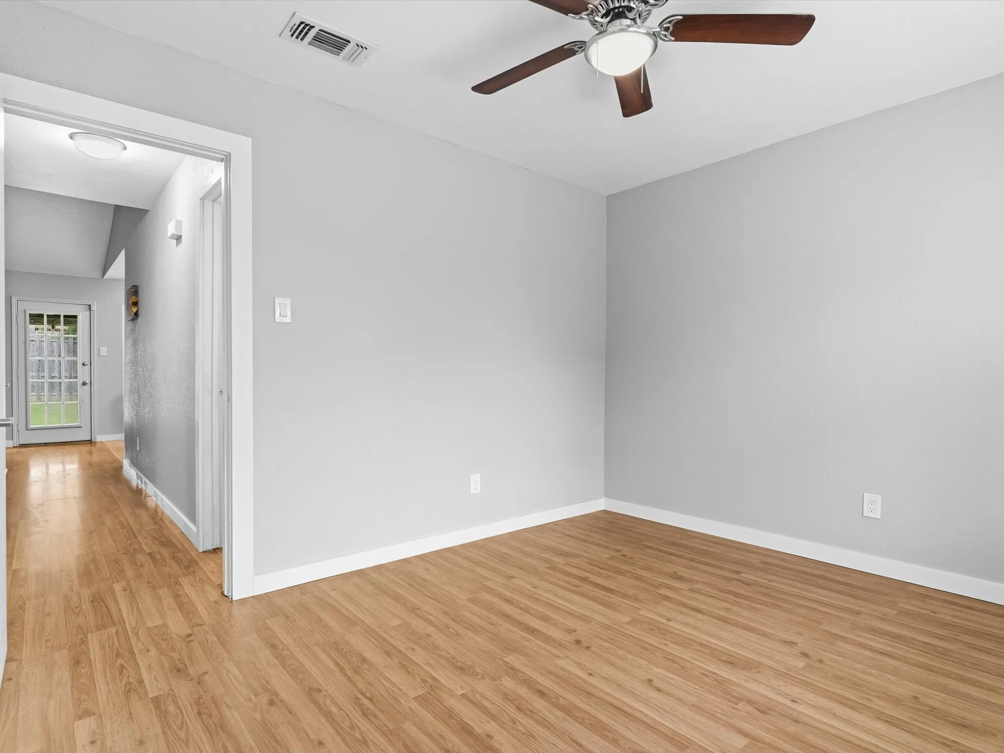 Secondary bedroom with closet storage and versatile use options.