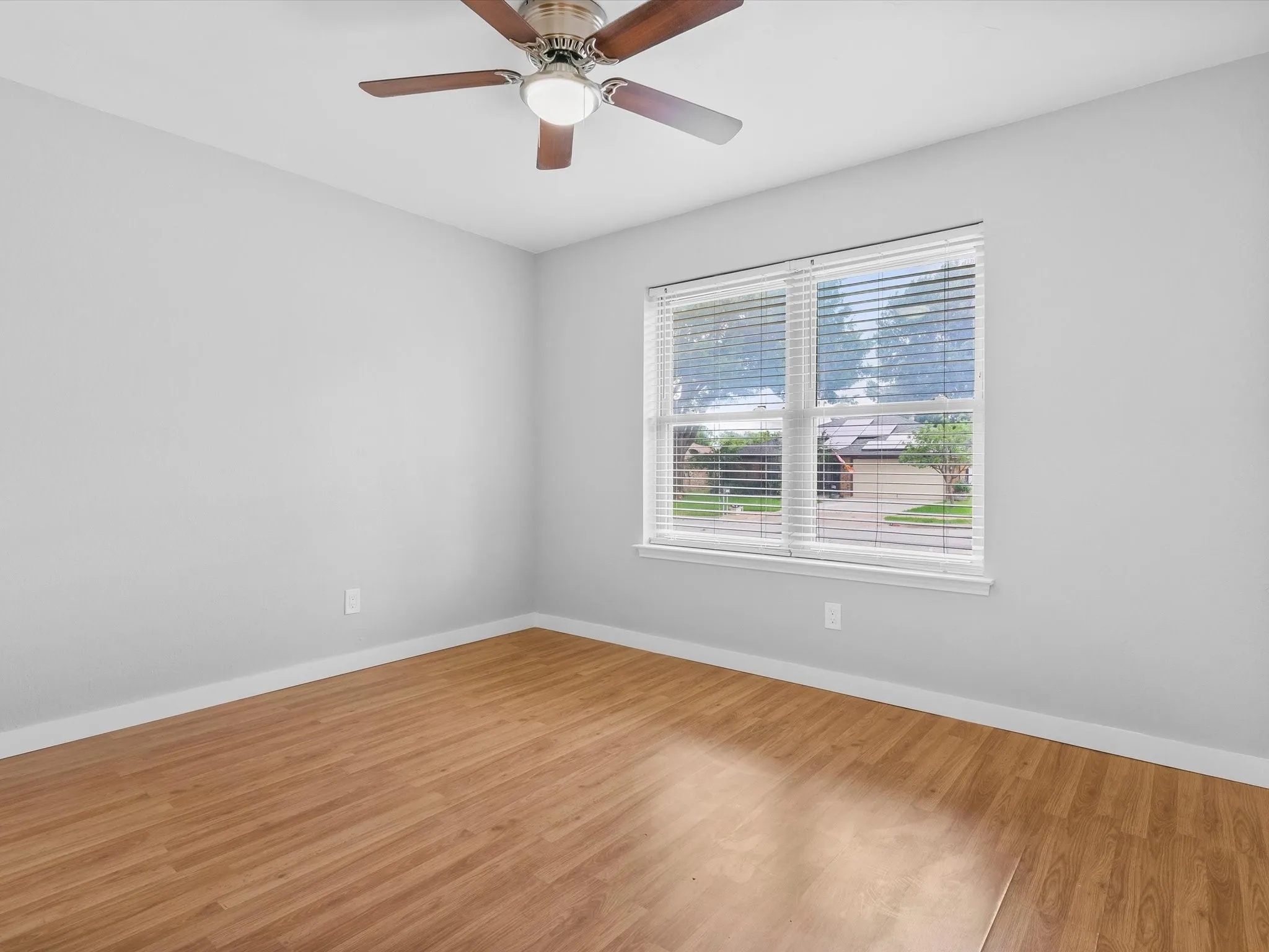 Secondary bedroom with closet storage and versatile use options.