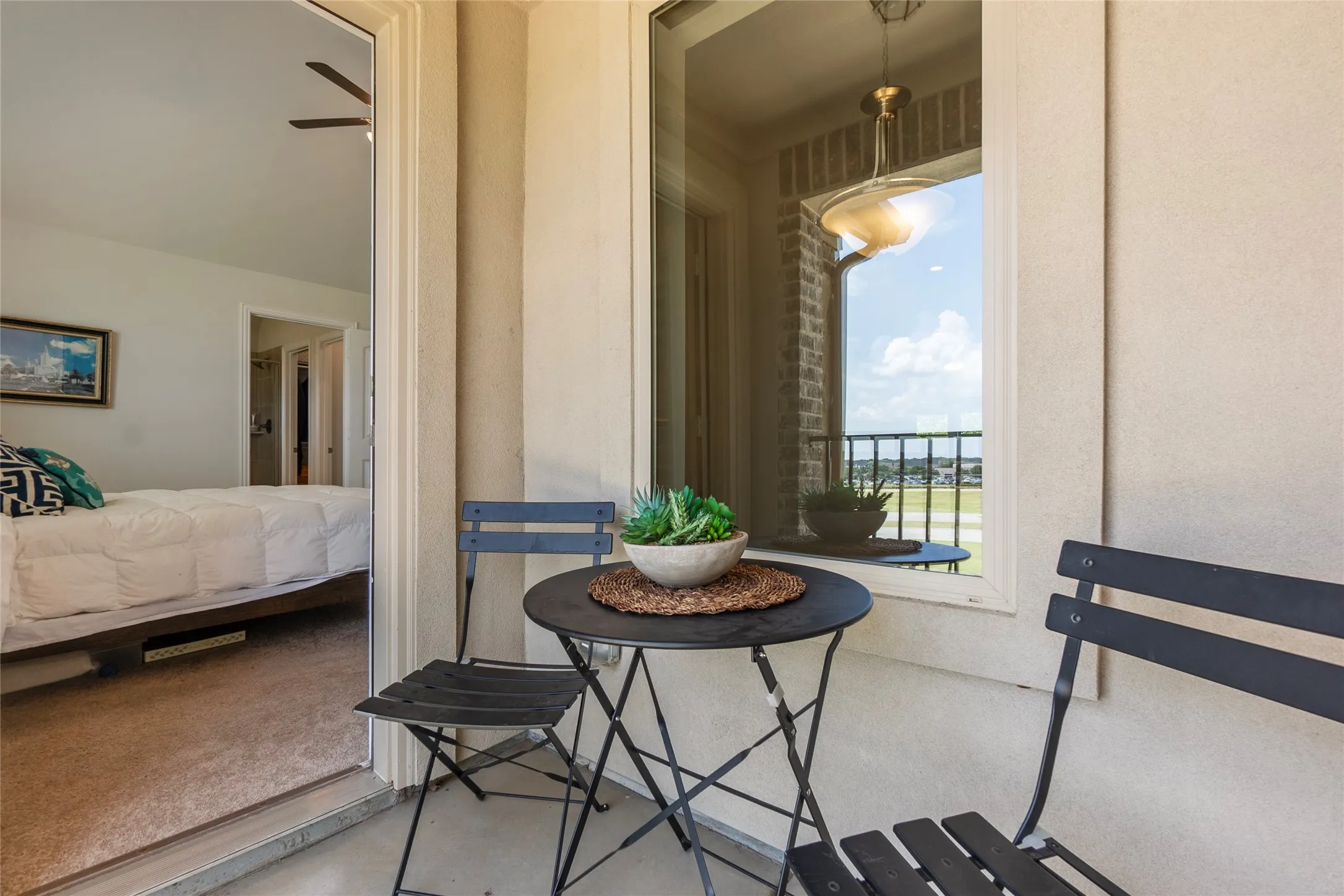 Enjoy the fresh air and your morning coffee on the primary bedroom balcony