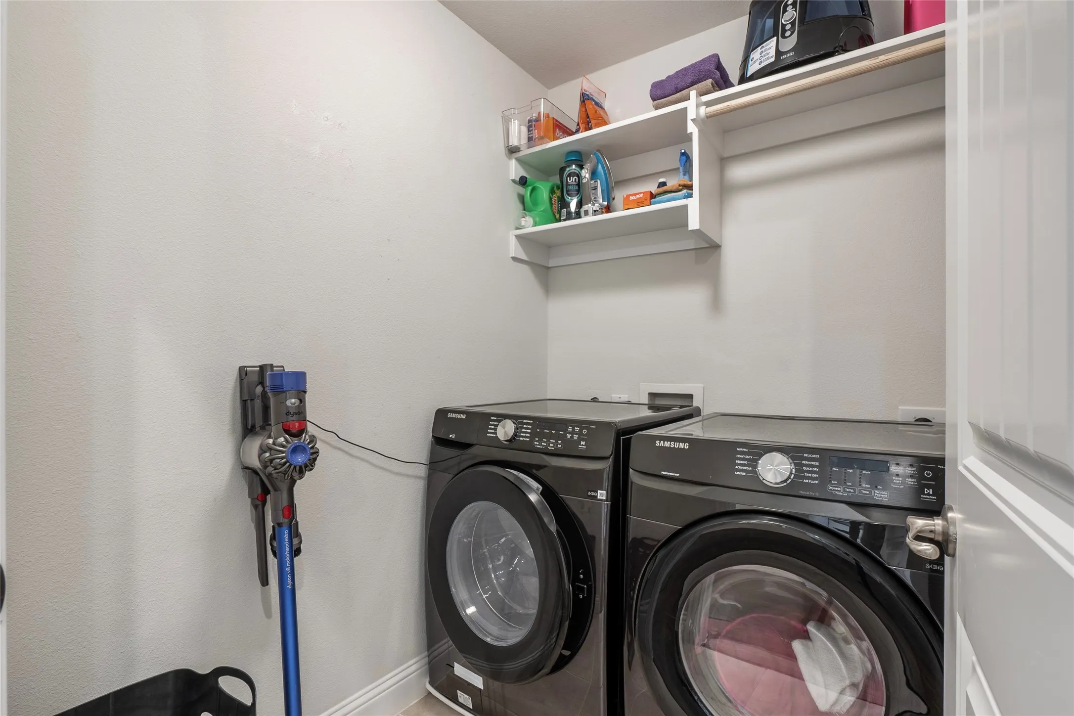Laundry room UP next to primary bedroom for easy access