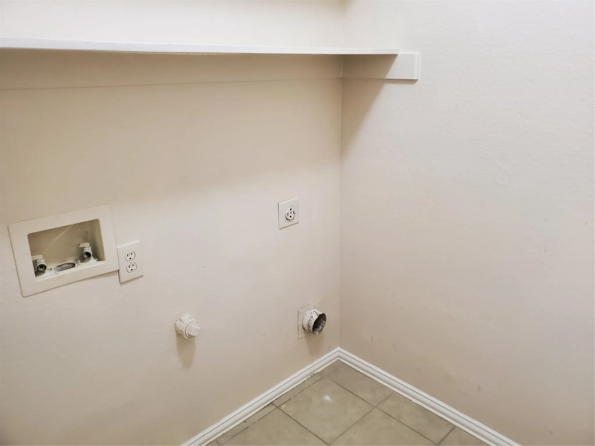 Laundry with washer, dryer hookup.  Next to kitchen can double as extended pantry.