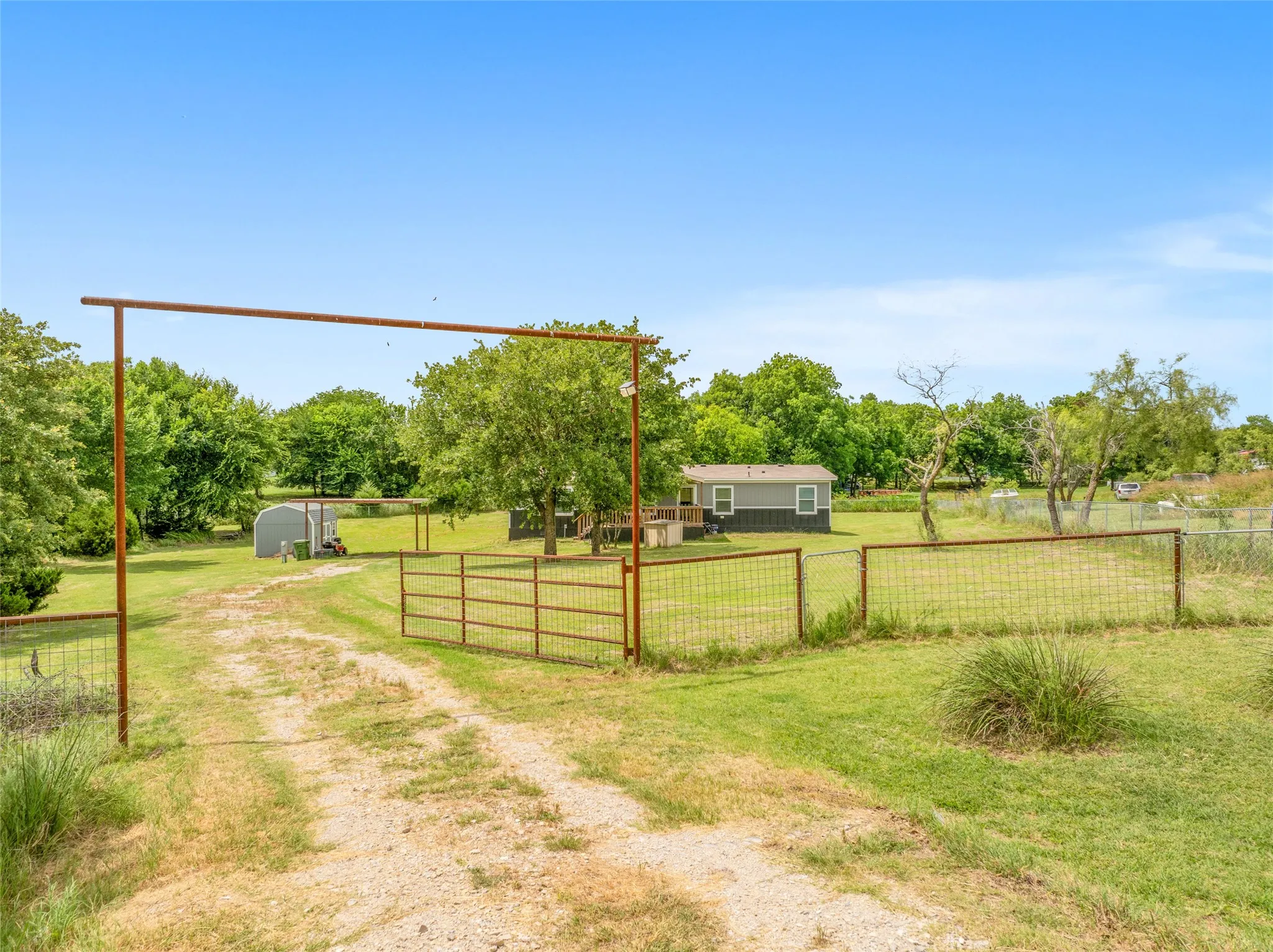 Fully fenced lot with gate