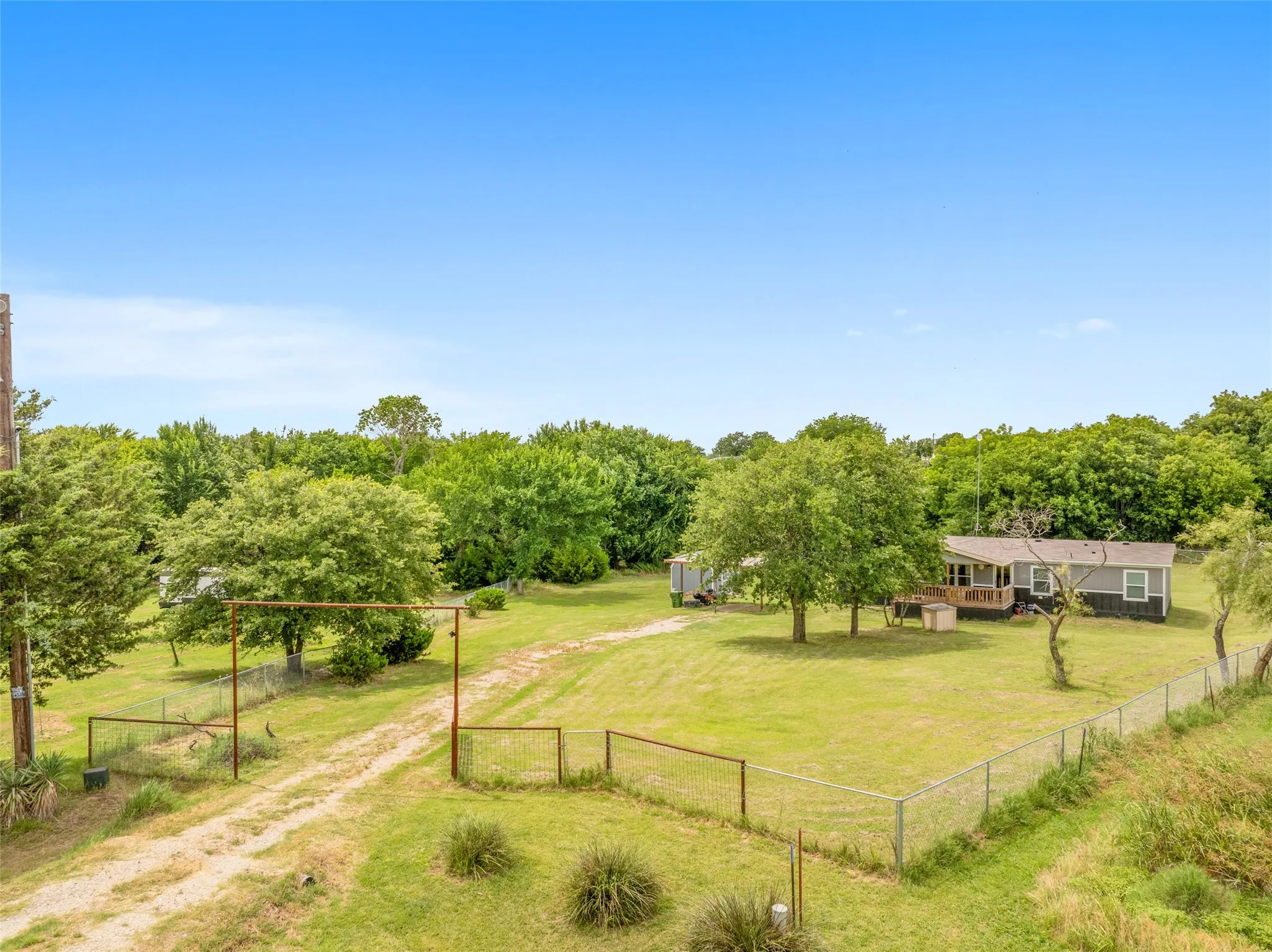 Fully fenced lot with gate