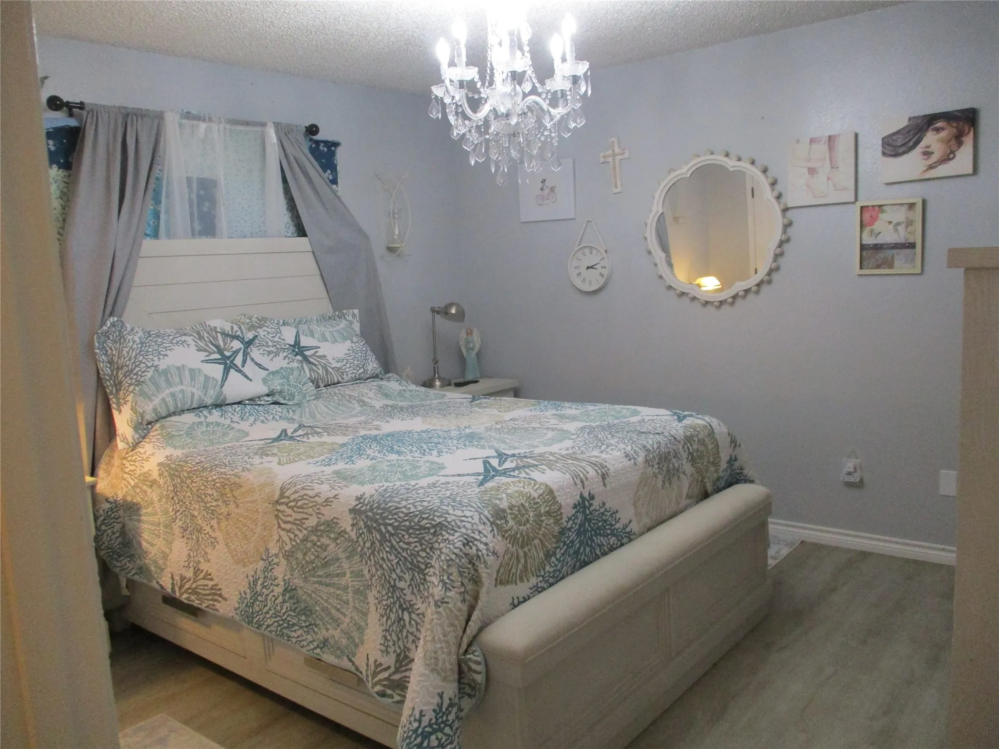 Soft gray walls and gray laminate flooring