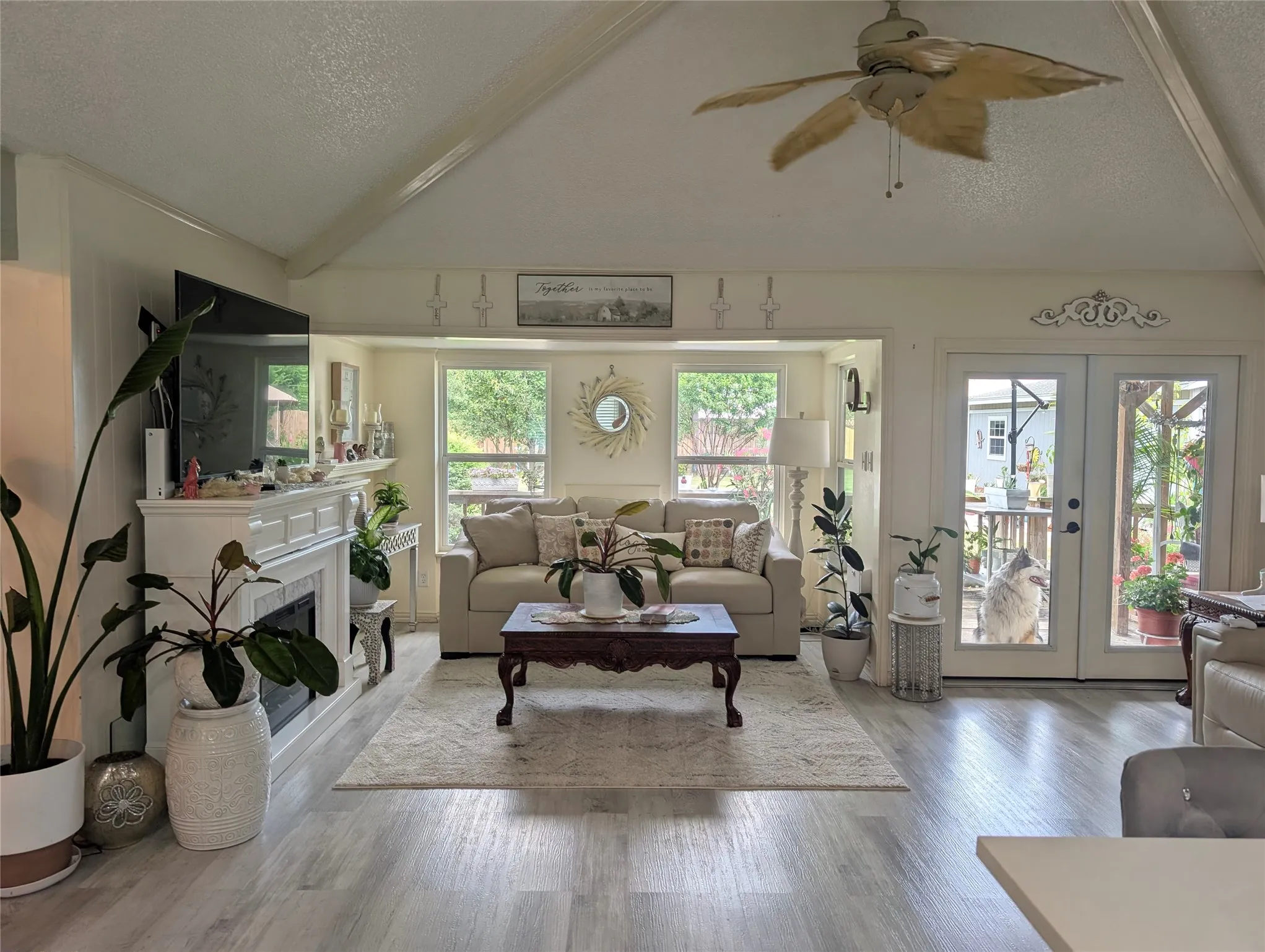 Bright and open with gray laminate flooring.