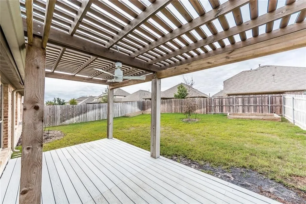 Pergola sitting on an extended patio.