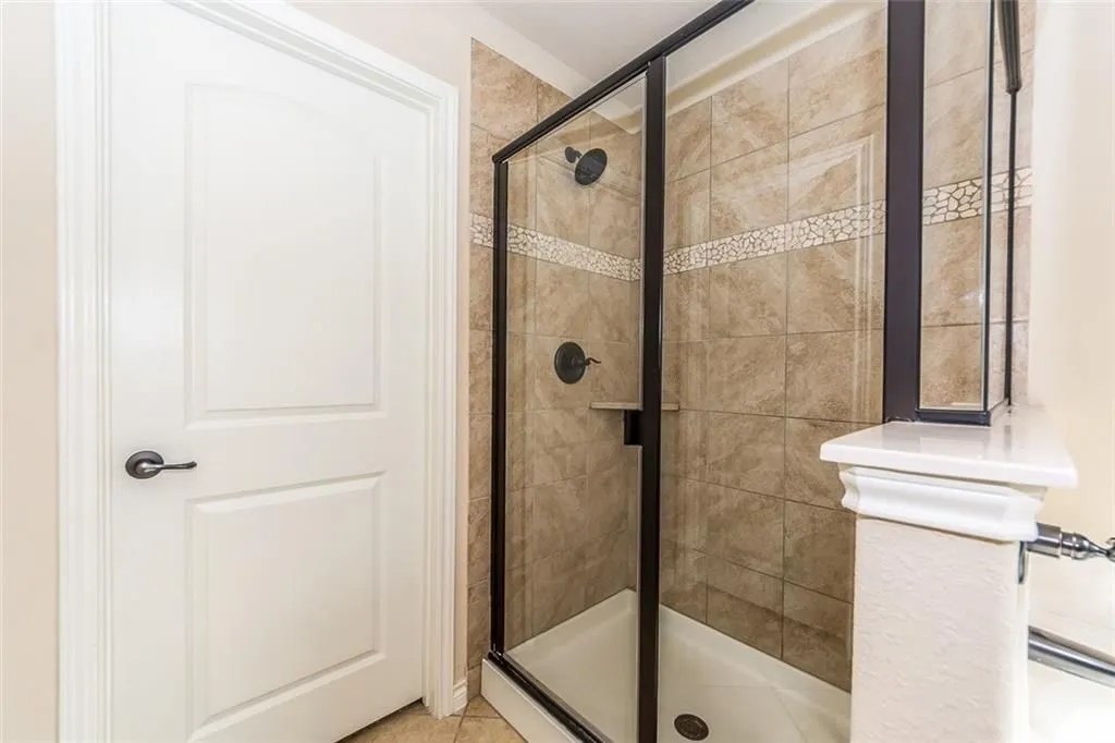 Nice size separate shower in the primary bedroom.