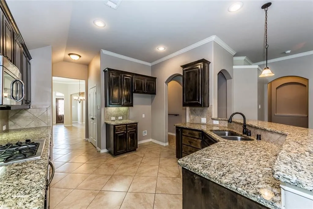 Kitchen connects to the formal dining .room through a passage with butlers pentry.
