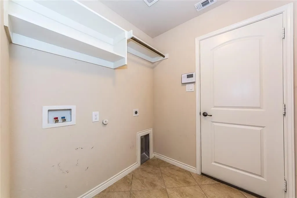 Laundry room as you enter from the garage into the house.