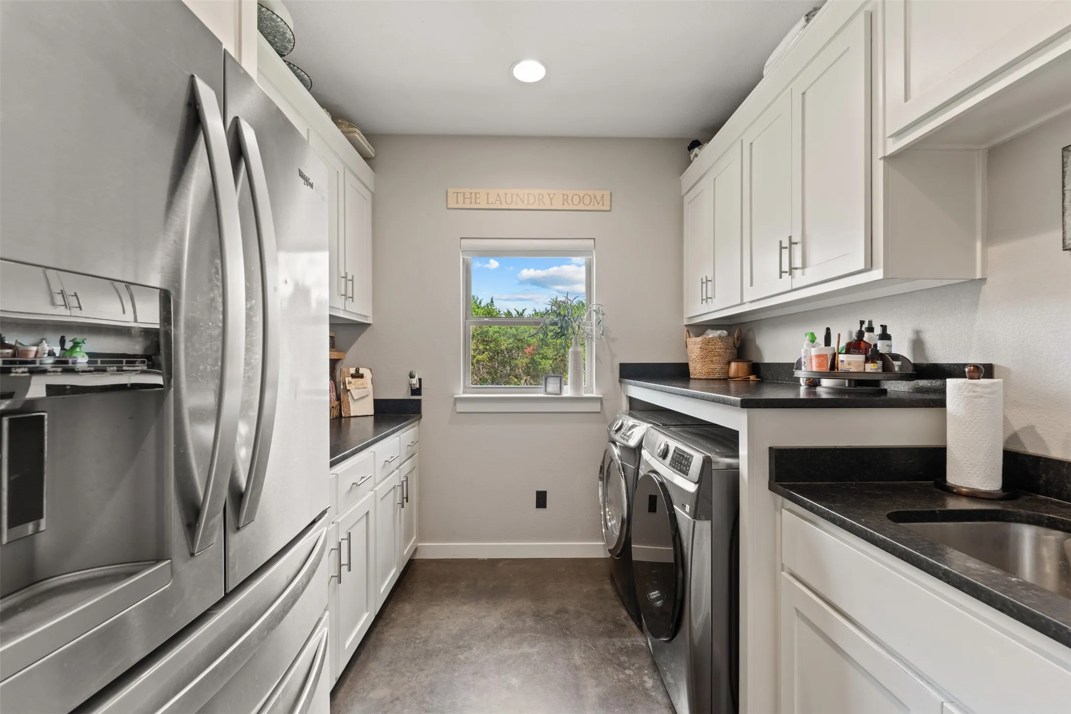 Spacious utility room with room for butlers pantry on the left