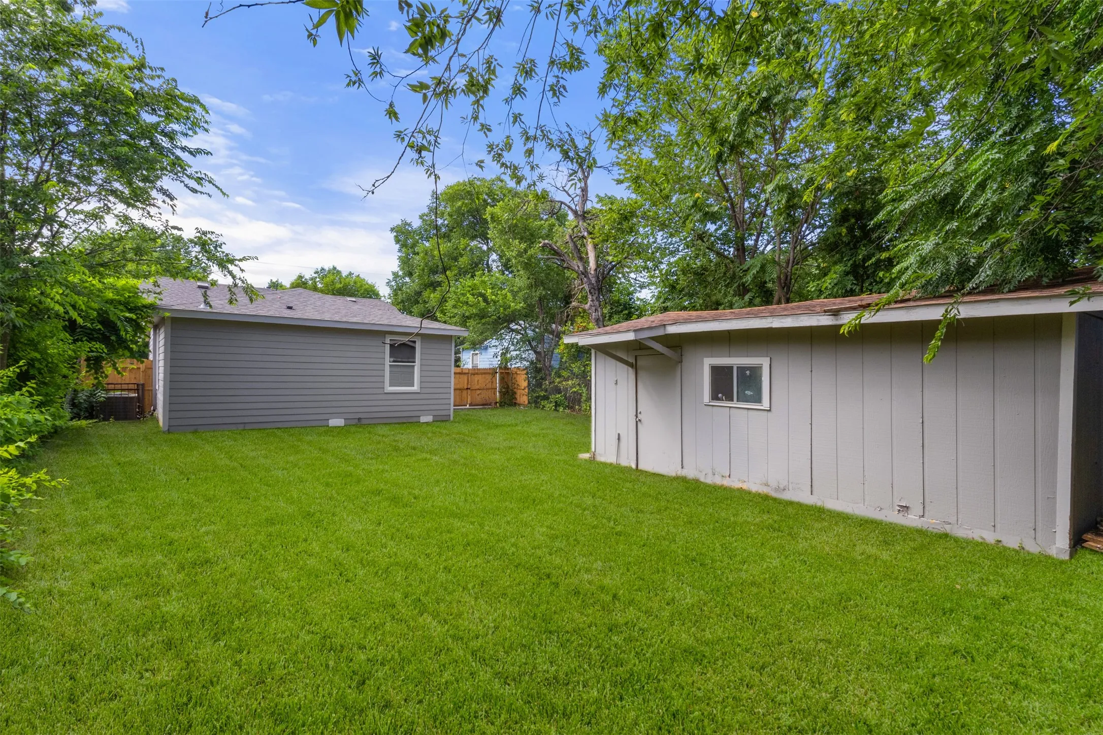 Expansive green lawn providing ample outdoor space