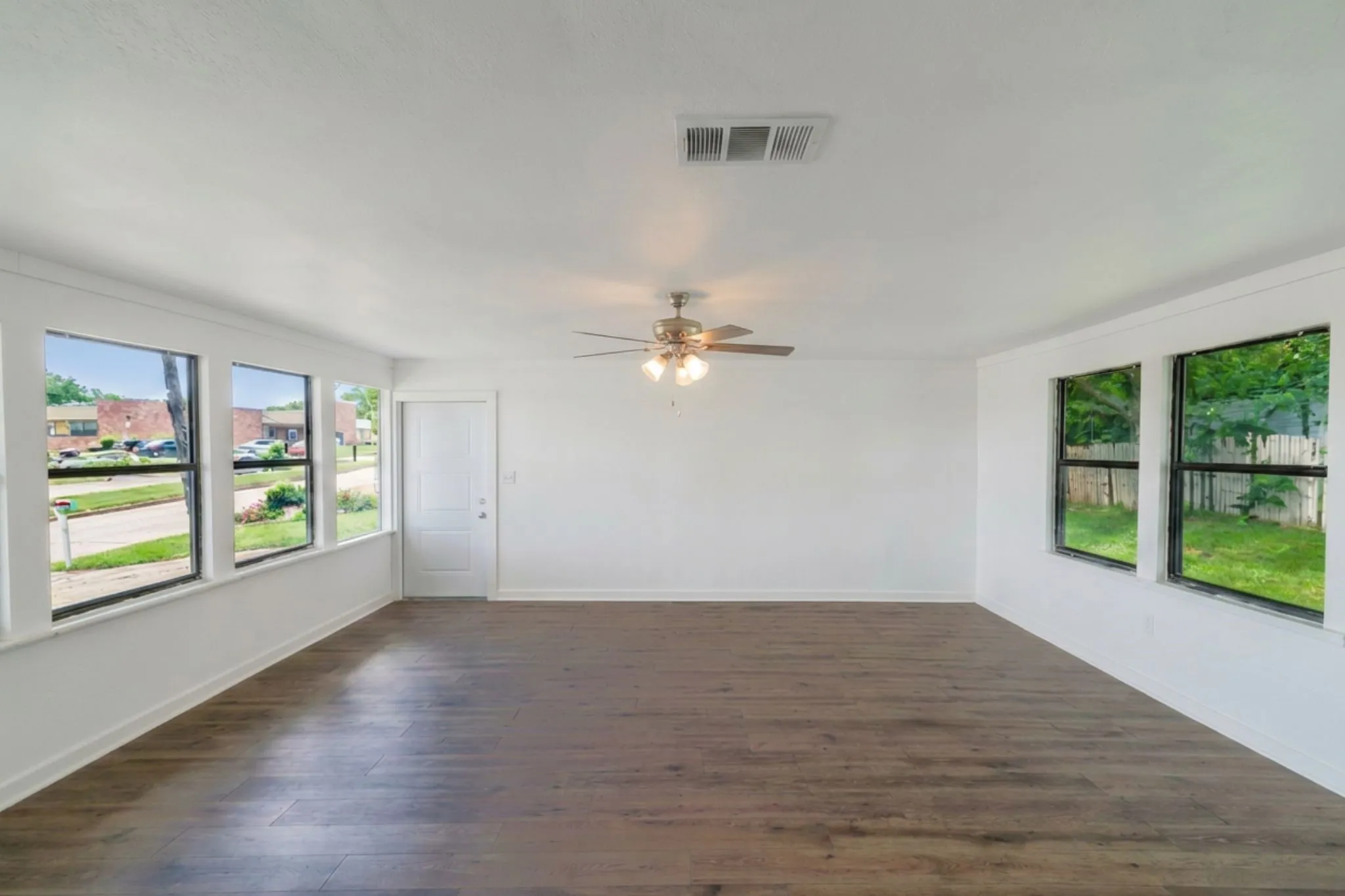 Large 15x20 family room with great views of the front and back.