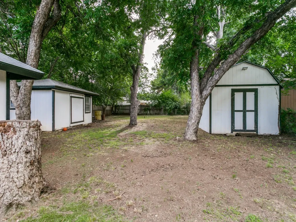 HUGE back yard with storage sheds