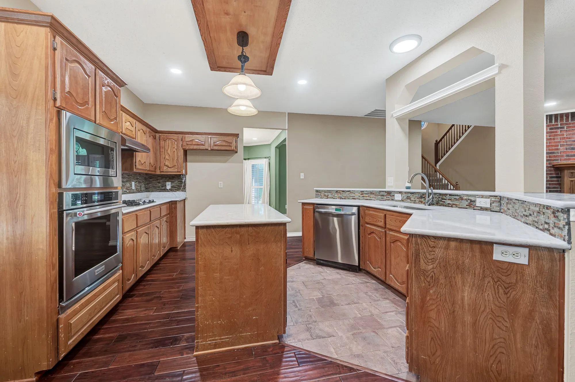 Updated counter tops and appliances with tons of cabinets!