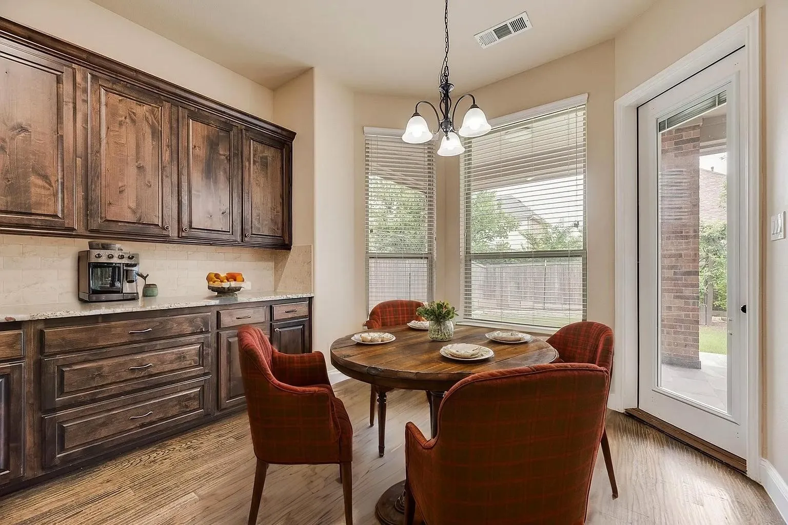 Wood-finish flooring with a glass-paneled door