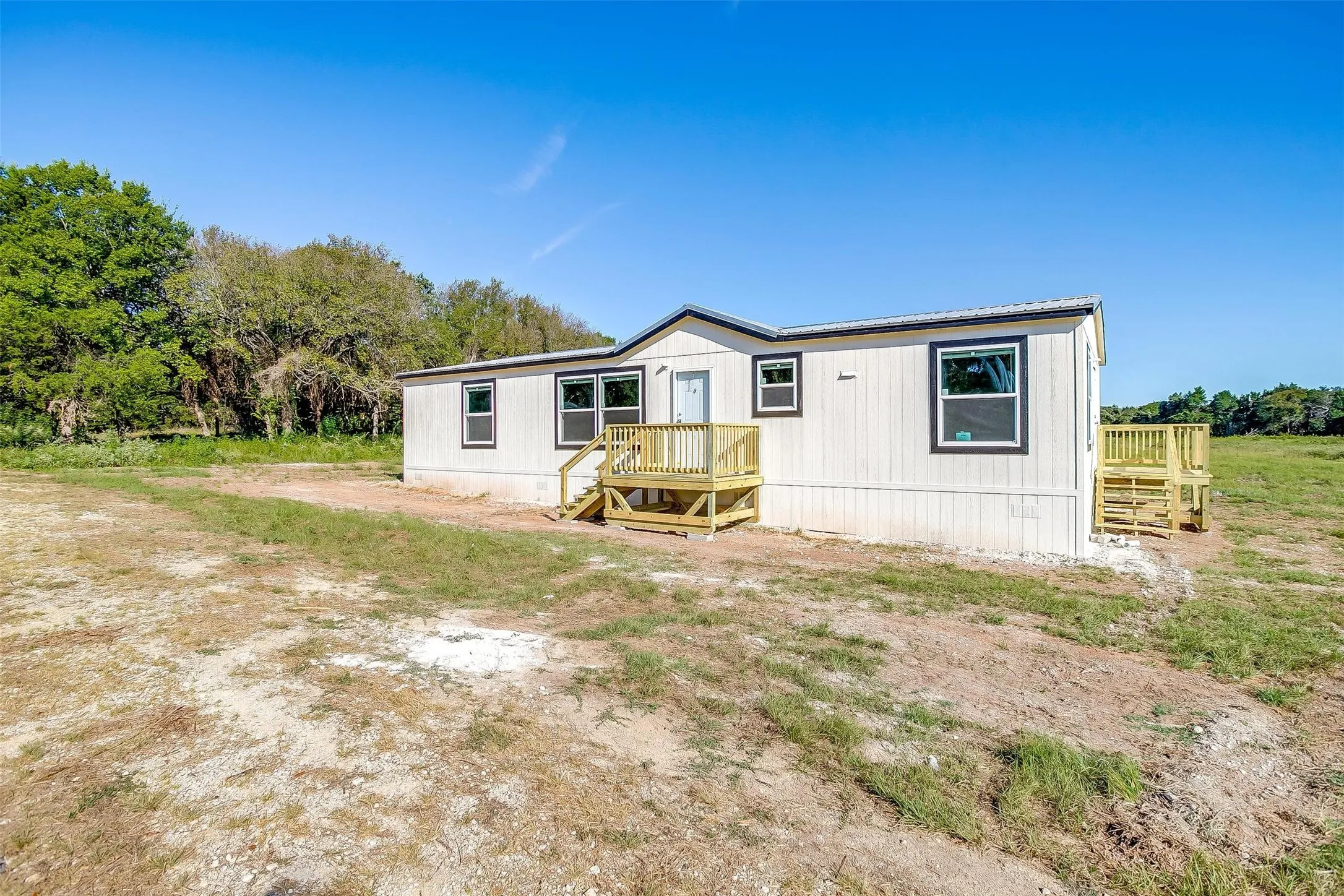 Manufactured Home For Sale in Johnson County , 4417 County Road 423, Grandview, Texas 76050, 4 Bedroom, 2 Bathroom, Garage spaces, 1,568 Sqft, built in 2024, mls#21287917, Real Estate Agent in Grandview, Homes For Sale in Johnson county, Homes For Sale in Grandview, Realtor in Grandview Texas, Real Estate Brokerage Independent Realty Texas, Luminita Cordes Realtor