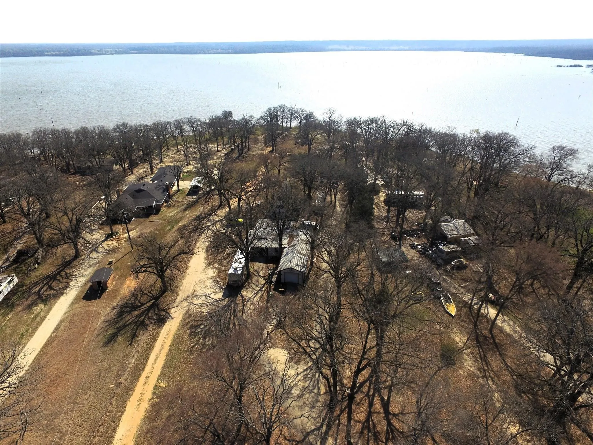 Single Family Residence For Sale in Hunt County , 8087 Lakeview Drive, Quinlan, Texas 75474, 1 Bedroom, 2 Bathroom, 4 Garage spaces, 1,580 Sqft, built in 1983, mls#21302092, Real Estate Agent in Quinlan, Homes For Sale in Hunt county, Homes For Sale in Quinlan, Realtor in Quinlan Texas, Real Estate Brokerage Independent Realty Texas, Luminita Cordes Realtor